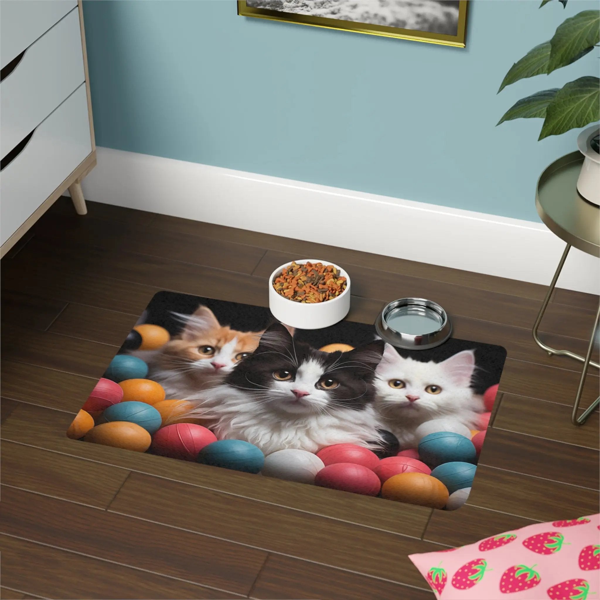 Pet Feeding Mats | two cats eating out of bowls on a mat