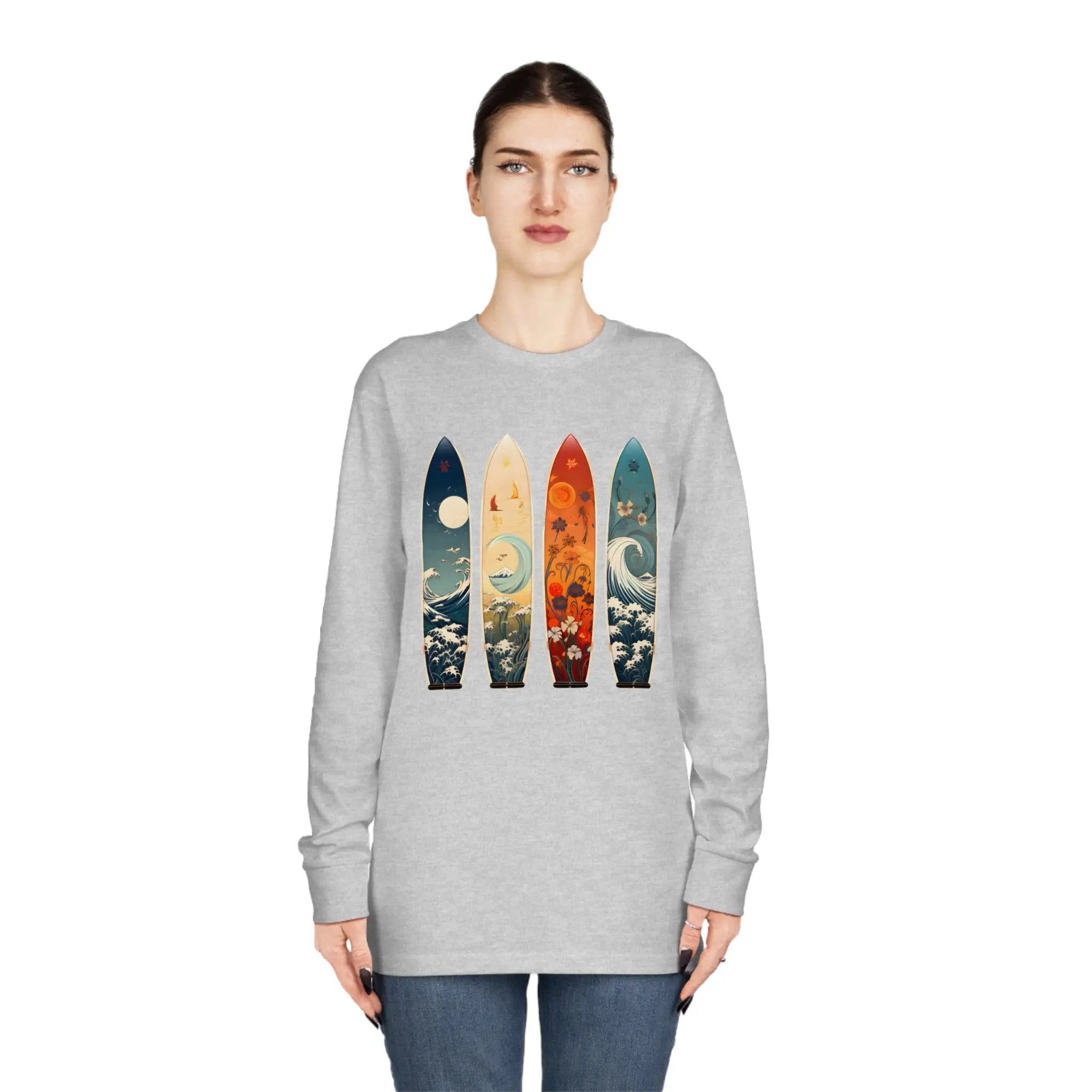 Long Sleeve t shirt | a woman wearing a sweatshirt with four surfboards on it