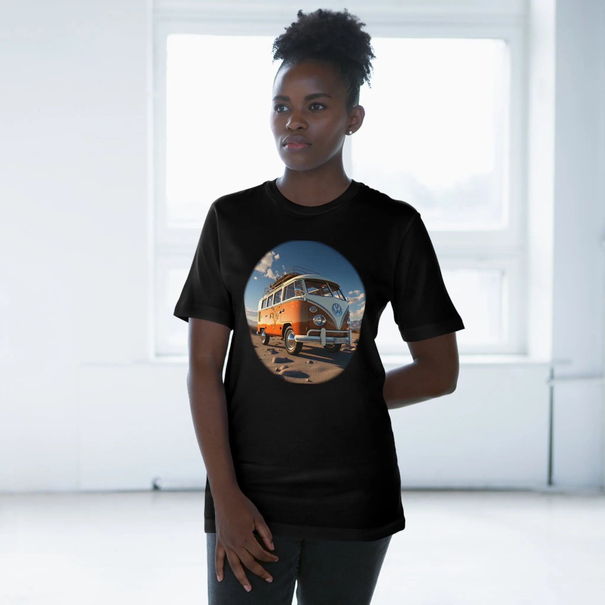 graphic men shirt | a woman wearing a black t - shirt with a picture of a bus on it