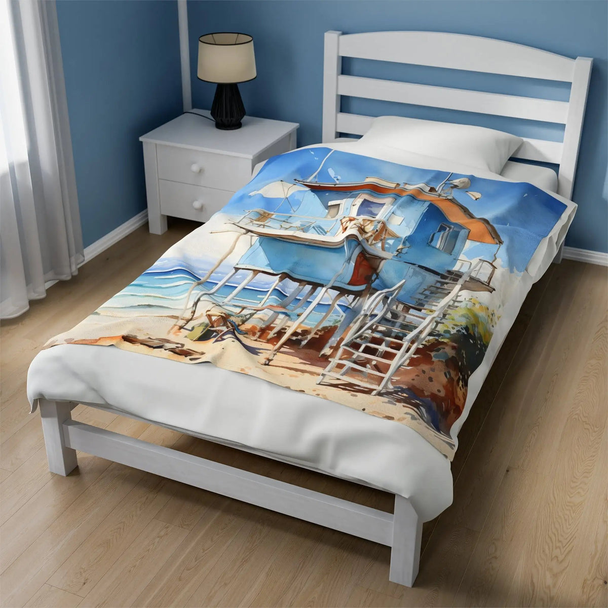 bedroom Blanket | a bed with a painting of a beach cabin on it