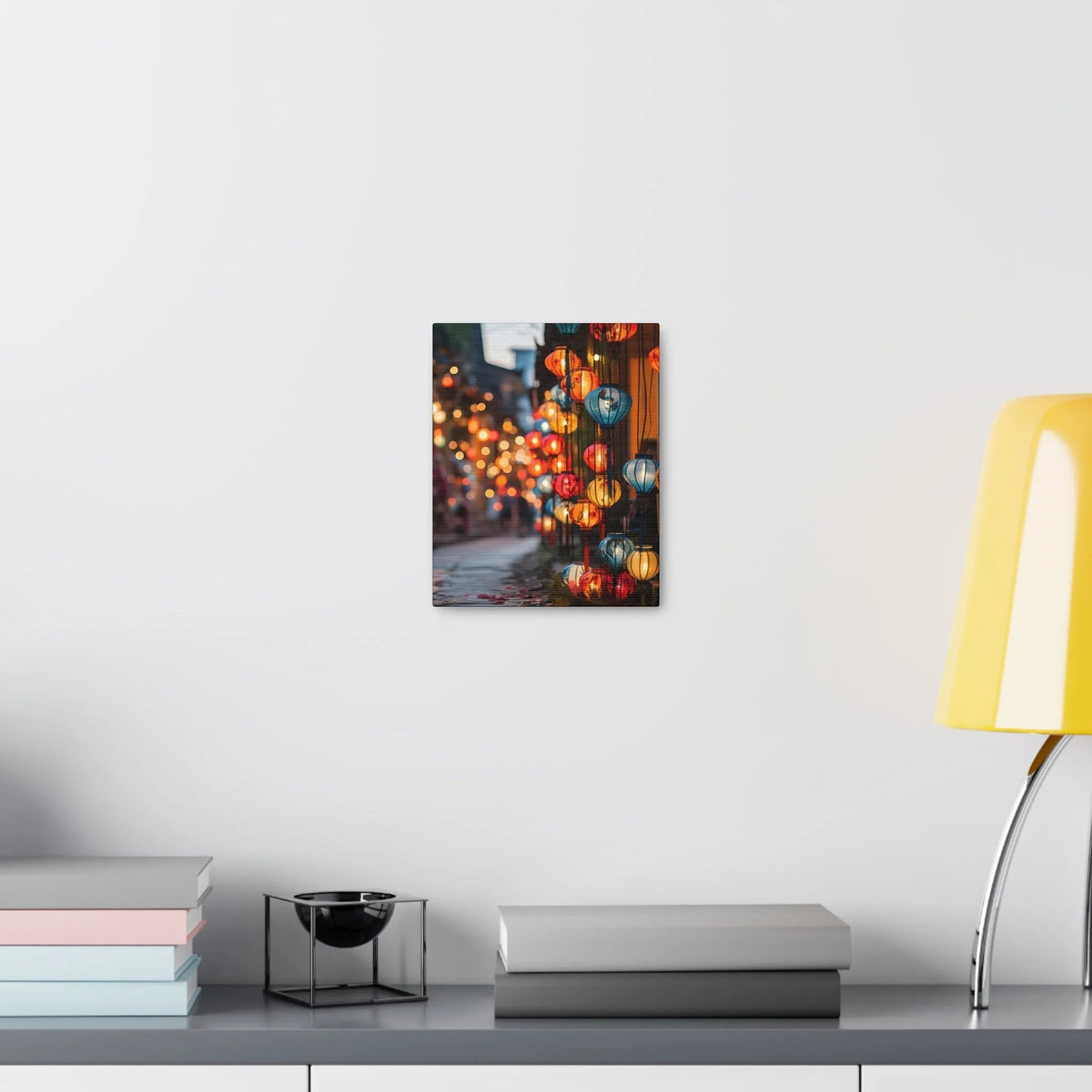 Canvas Gallery Wraps | a table with a lamp on it next to a white wall