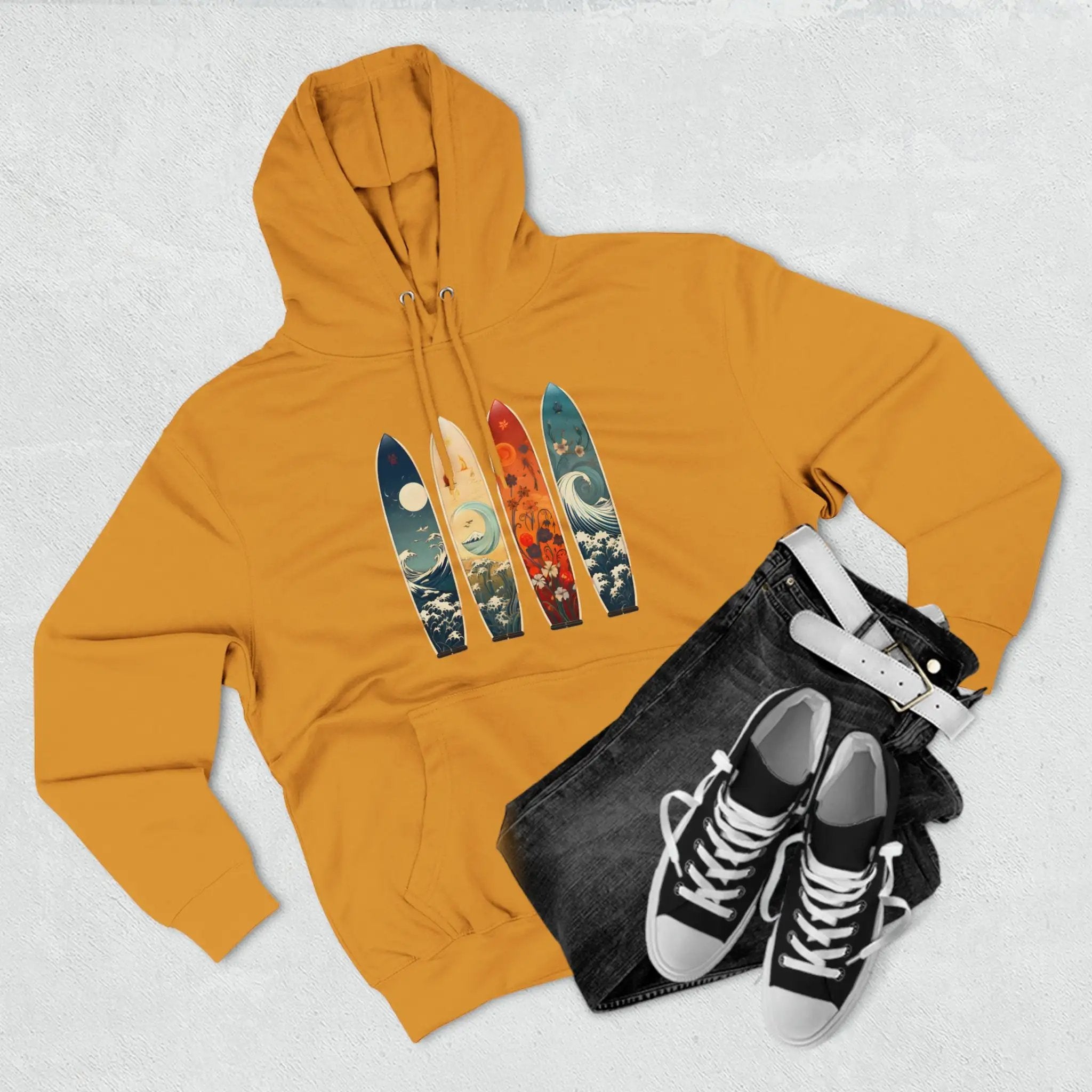 pullover hoodie | a yellow hoodie with a pair of sneakers and a pair of jeans