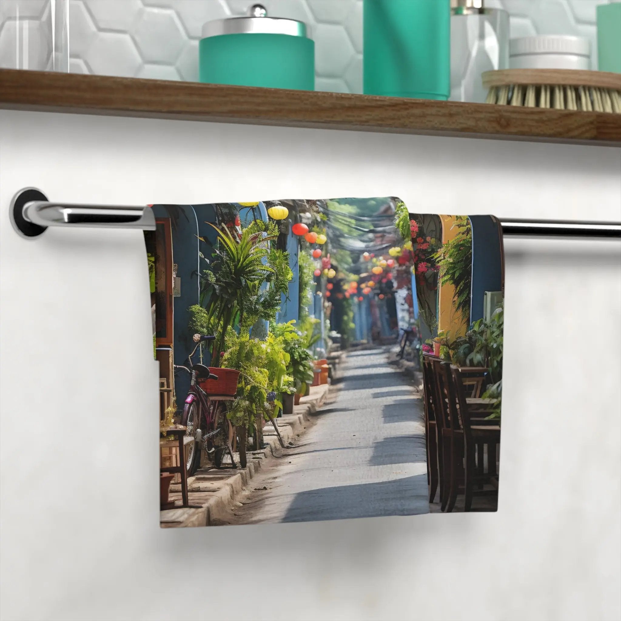 Face Towel | a picture of a narrow street with lanterns hanging from a clothes line