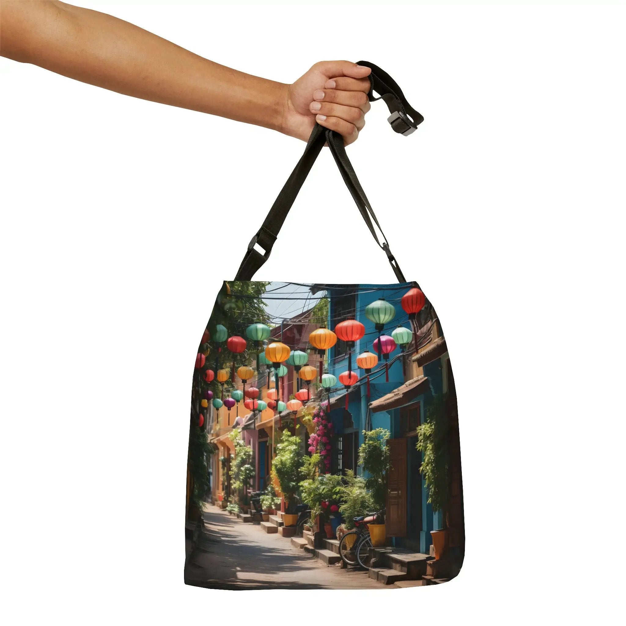 Weekender tote bag | a hand holding a bag with a picture of a street