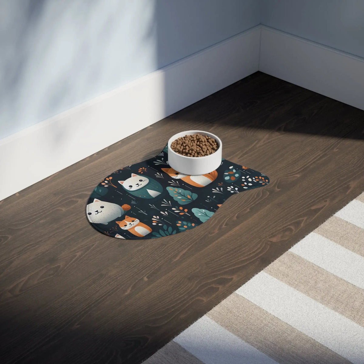 Pet Feeding Mats | a bowl of cat food on a wooden floor