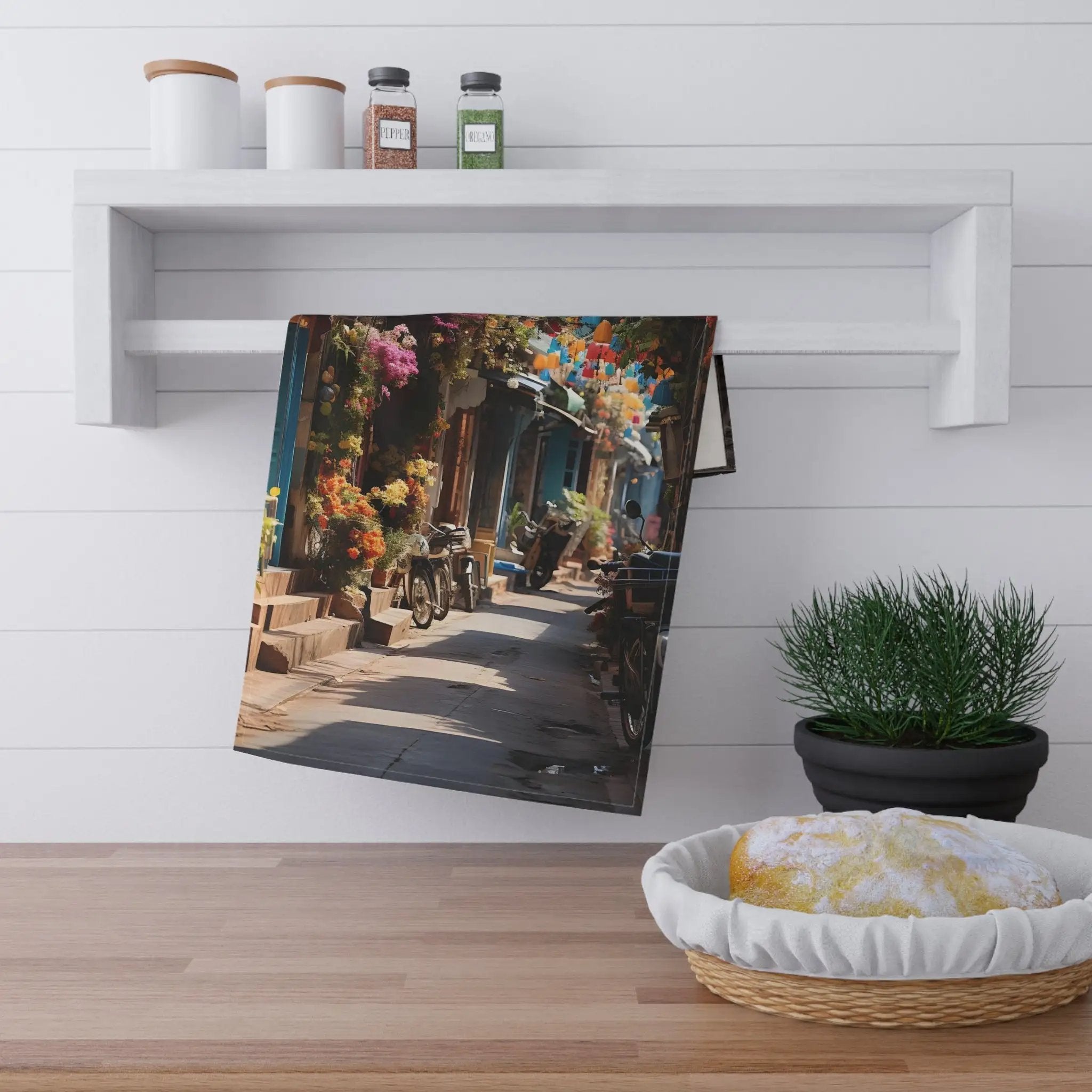 Kitchen Towel | a picture of a street with a potted plant next to it