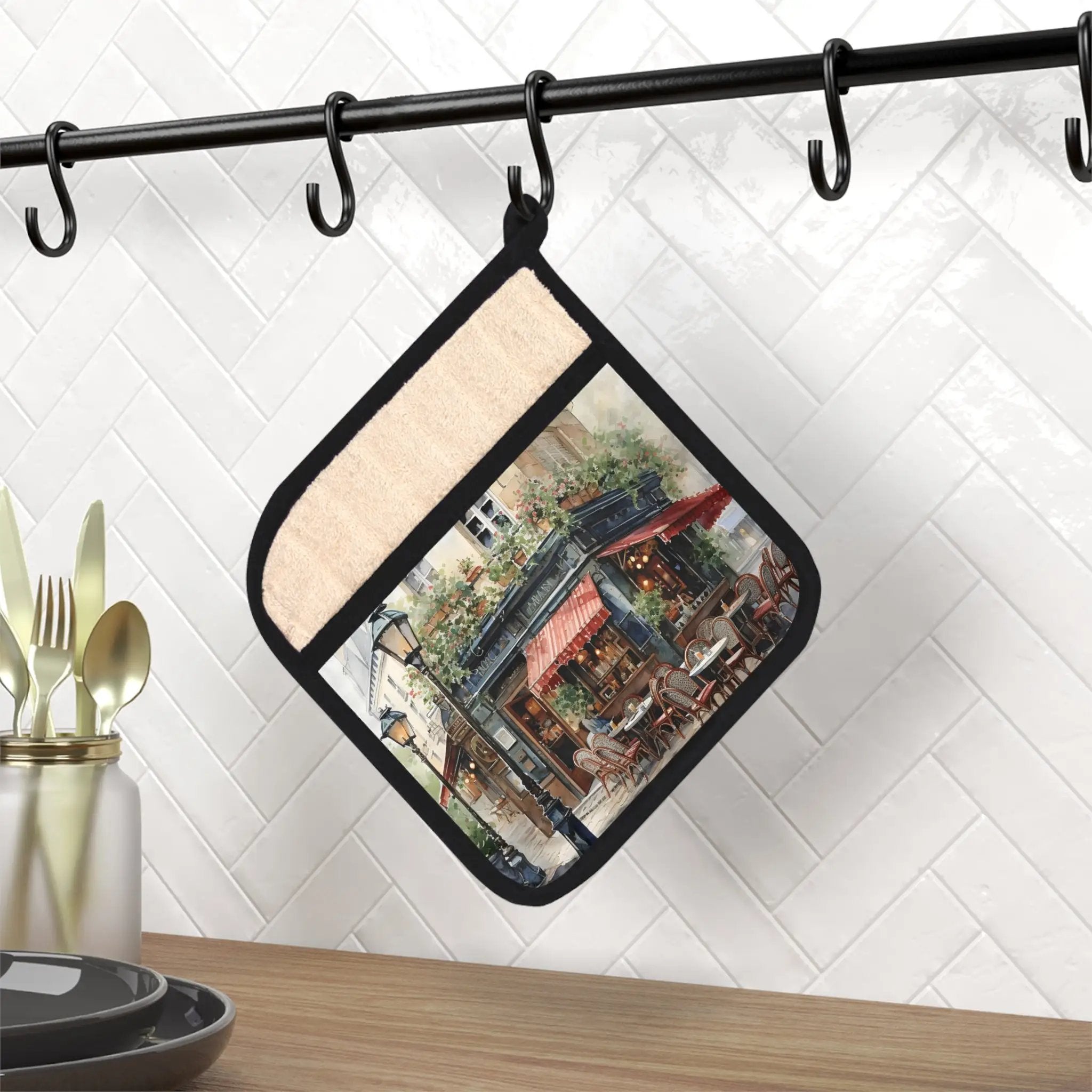 Pot Holder | a pot holder with a picture of a city on it