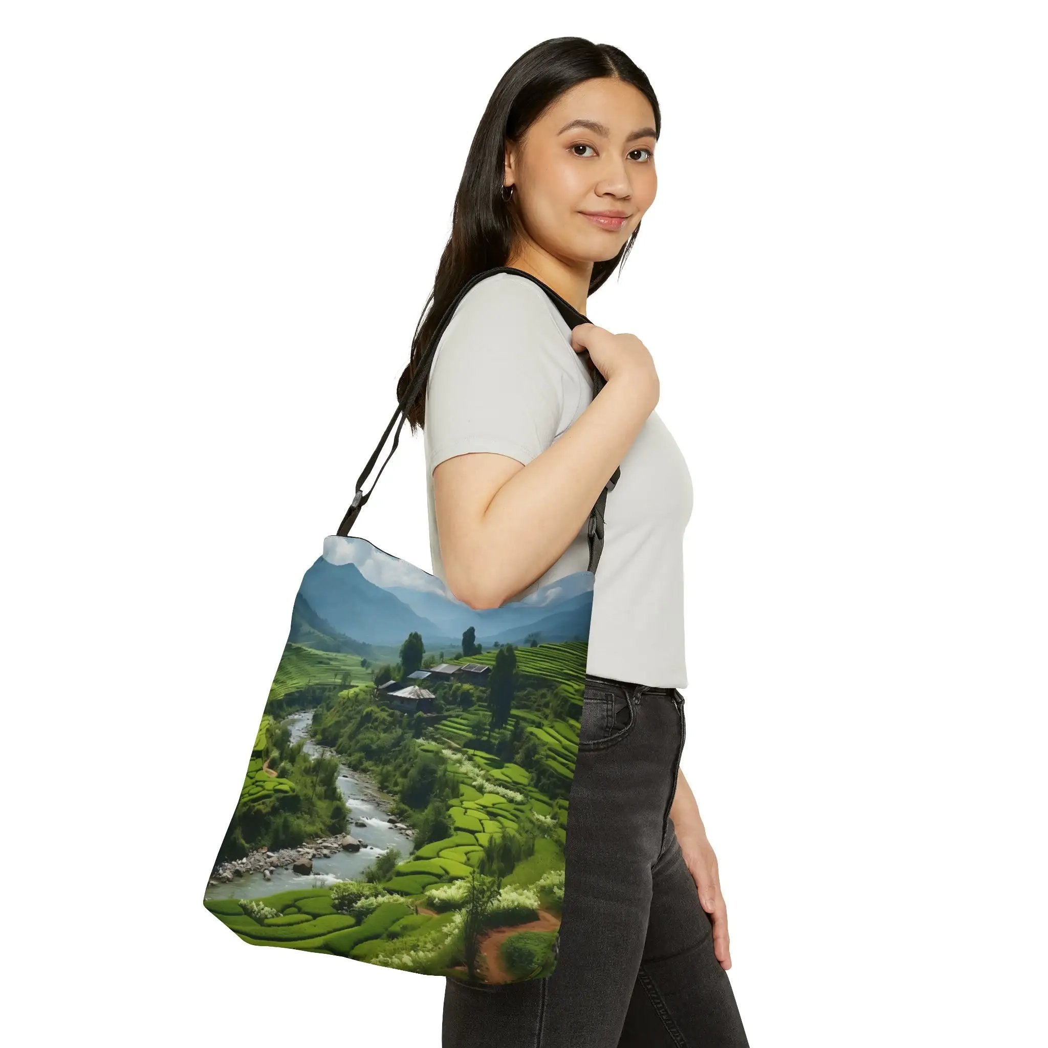 Weekender tote bag | a woman carrying a large bag with a picture of a valley