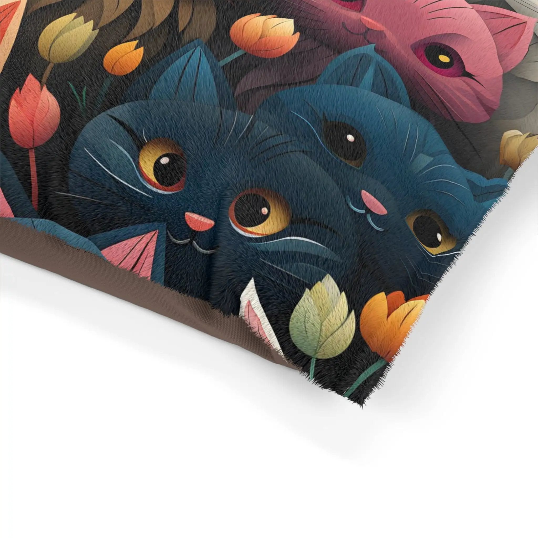 Pet bed | a close up of a book with cats on it