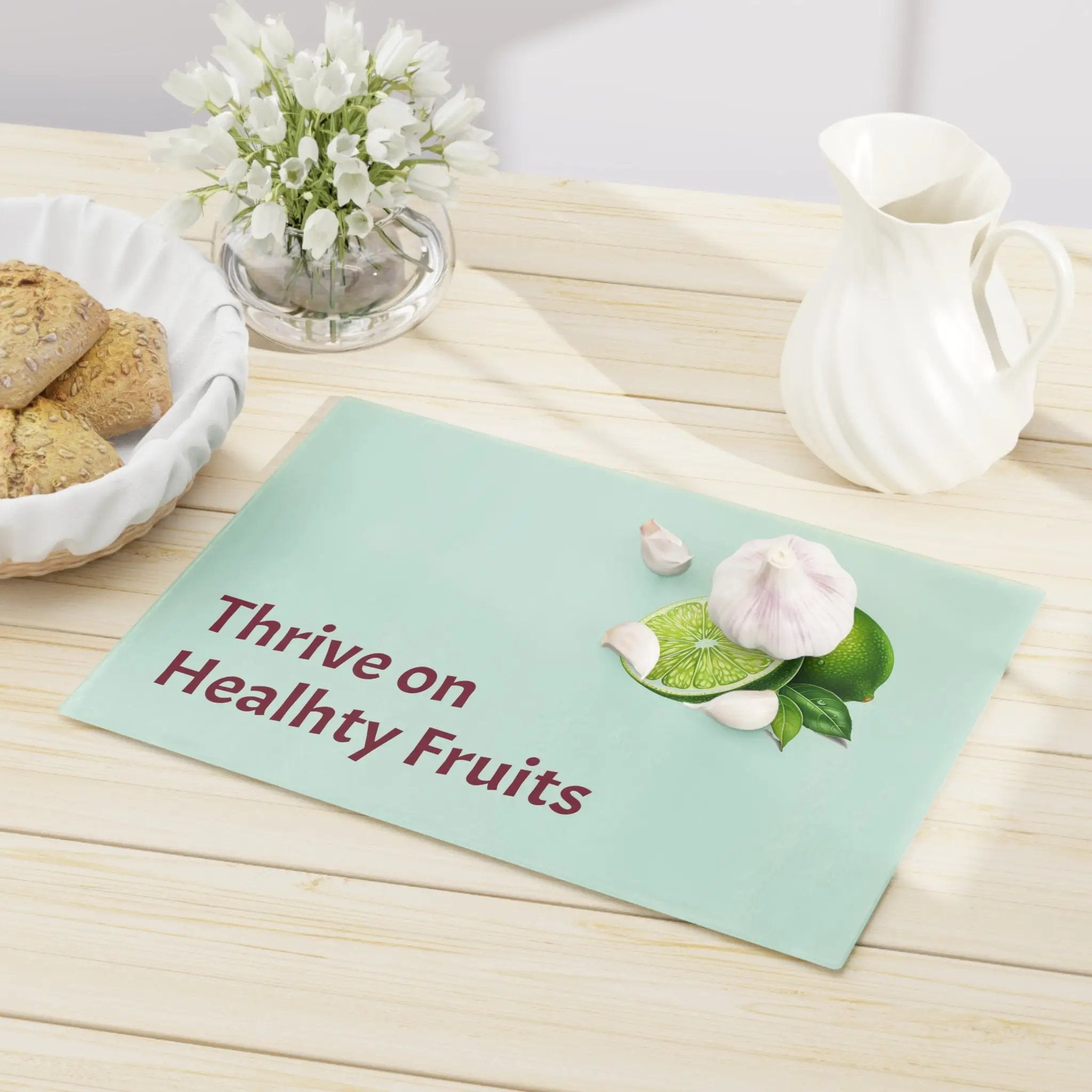 Cutting board | a table topped with a bowl of cookies and a plate of cookies