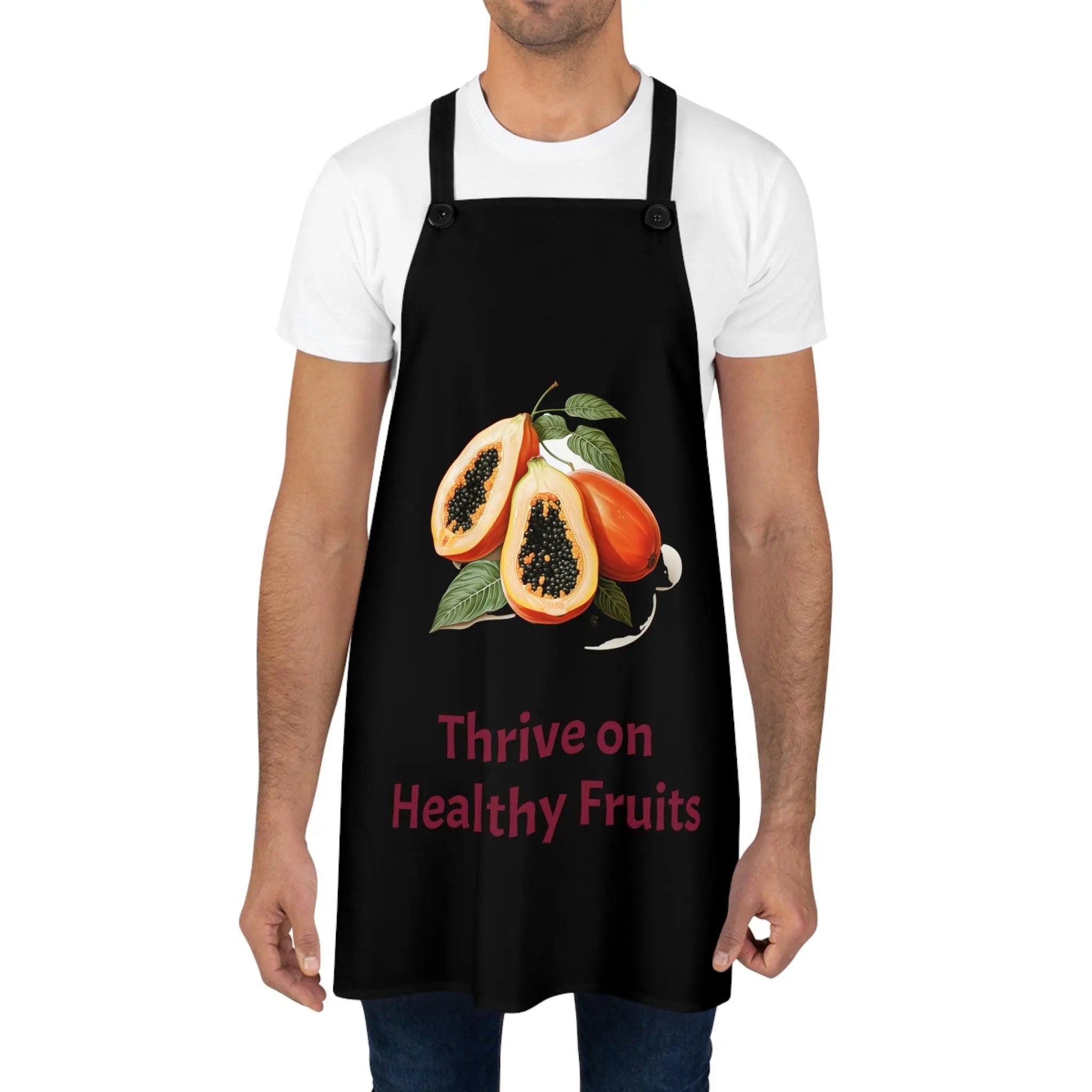 Chef Apron | a man wearing a black apron with a pomegranate on it