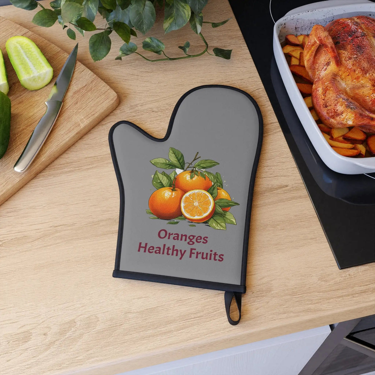 oven mitt | an oven mitt with a picture of oranges on it