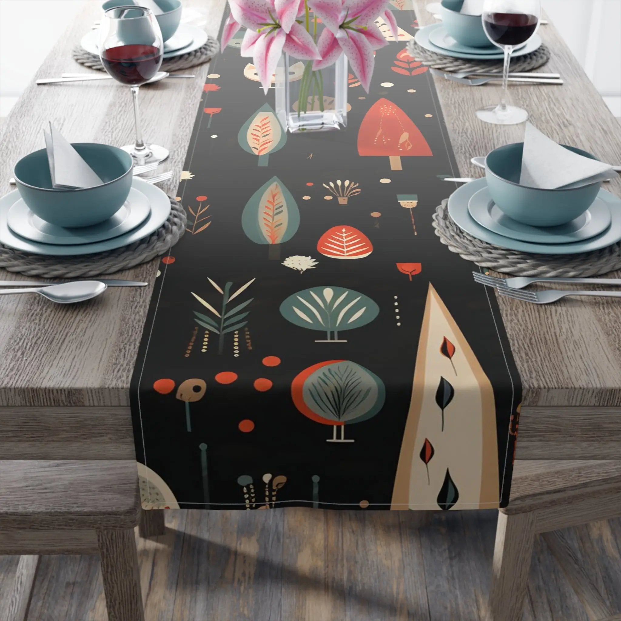 Table runner | a long table with a vase of flowers on it