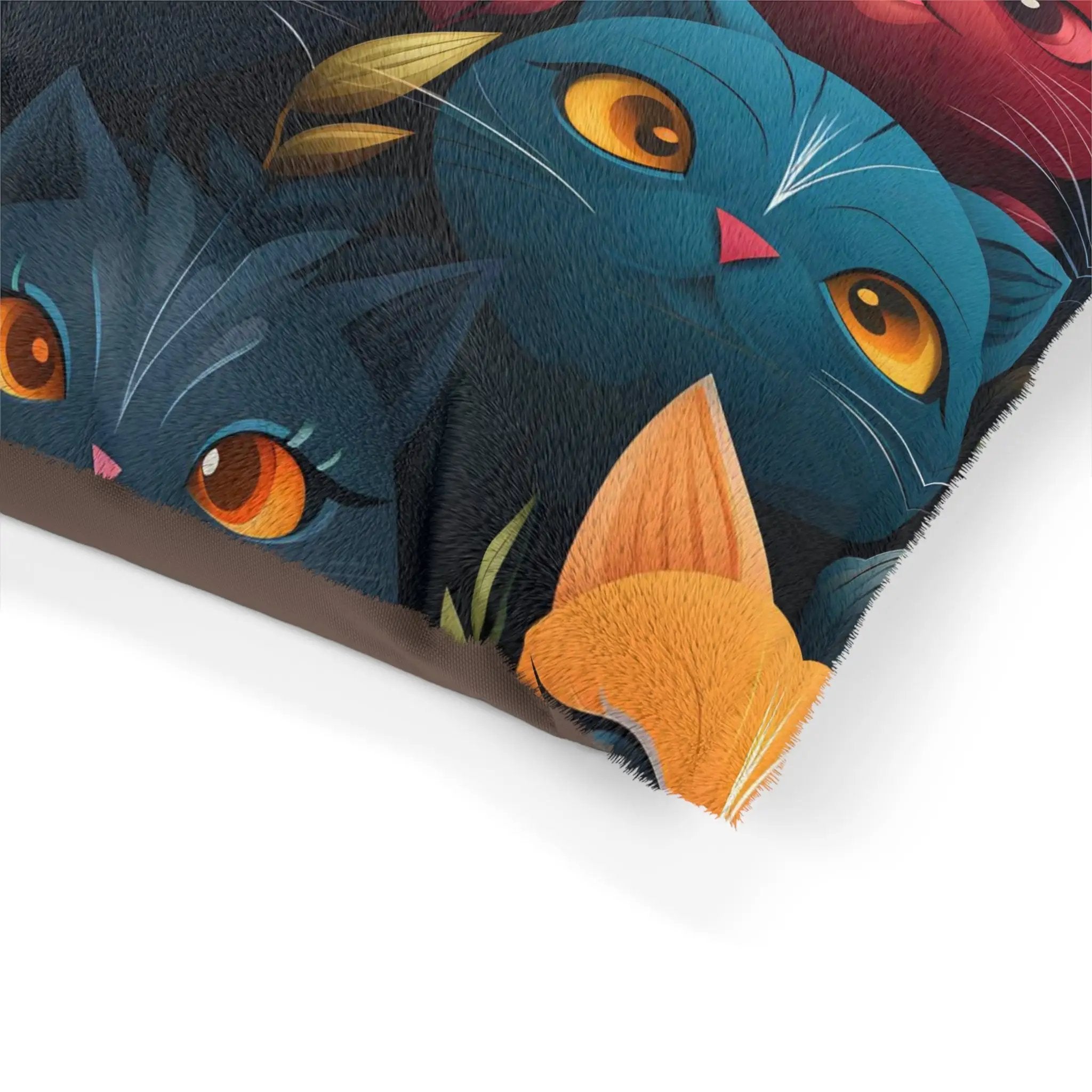 Pet bed | a close up of a pillow with cats on it