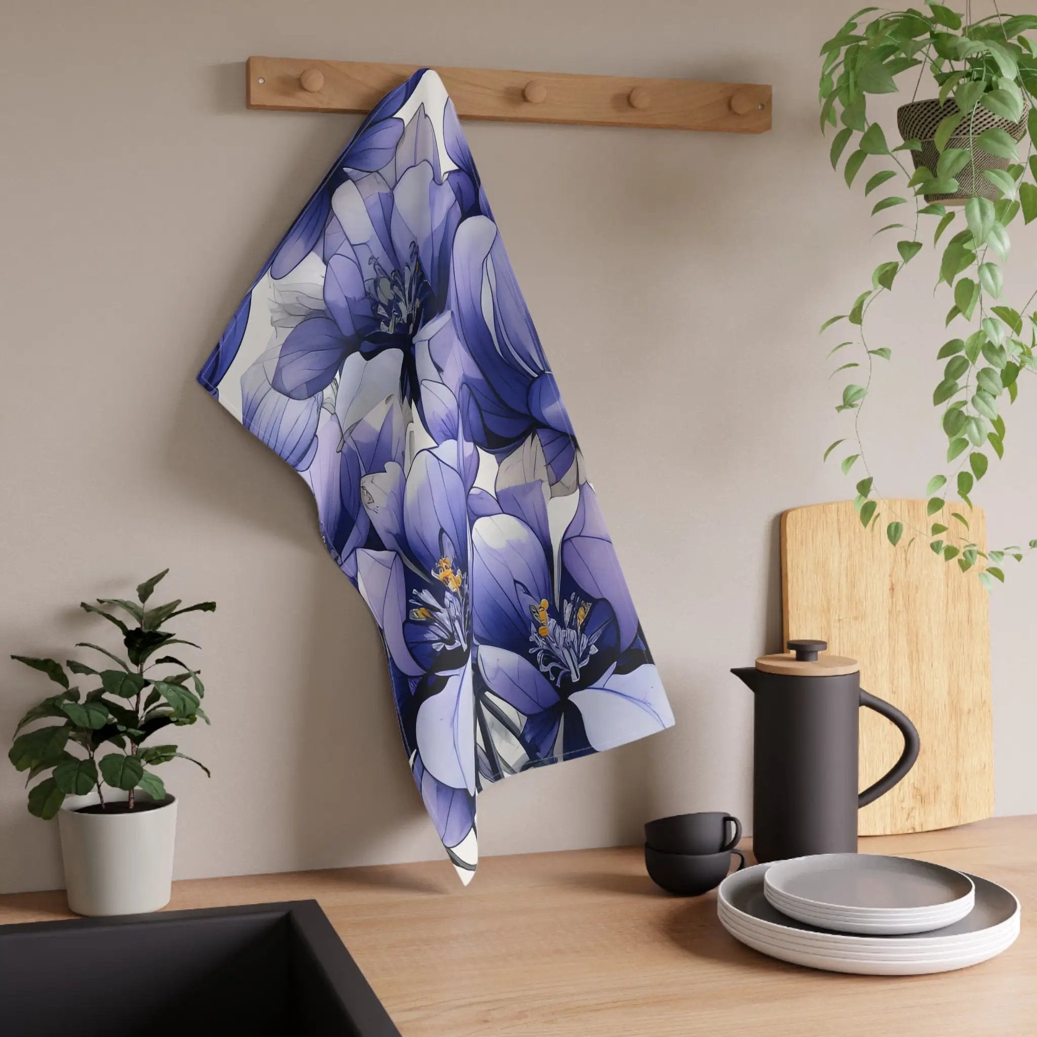 Kitchen Towel | a kitchen counter with a blue flower design on it