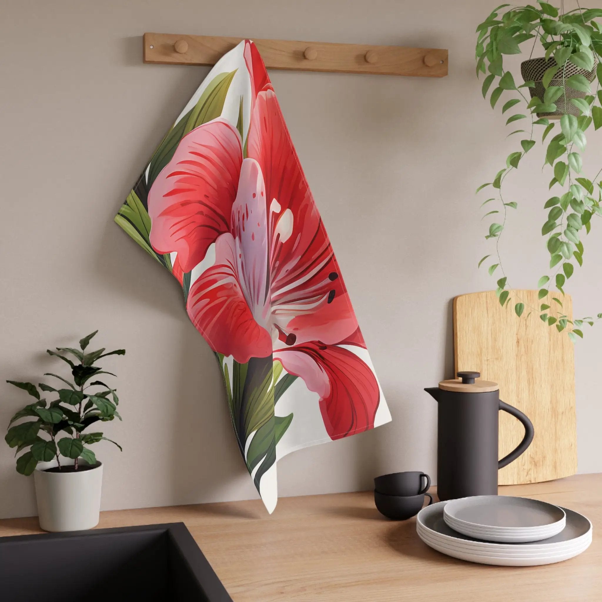 Kitchen Towel | a kitchen counter with a flowered towel hanging on the wall