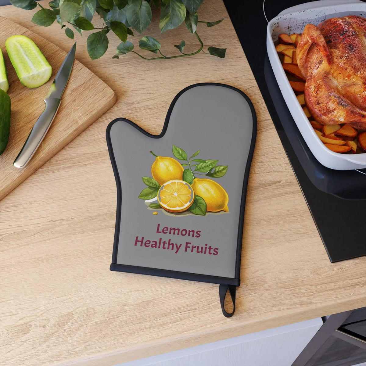 oven mitt | a cutting board with a cutting board with a picture of lemons and healthy fruits