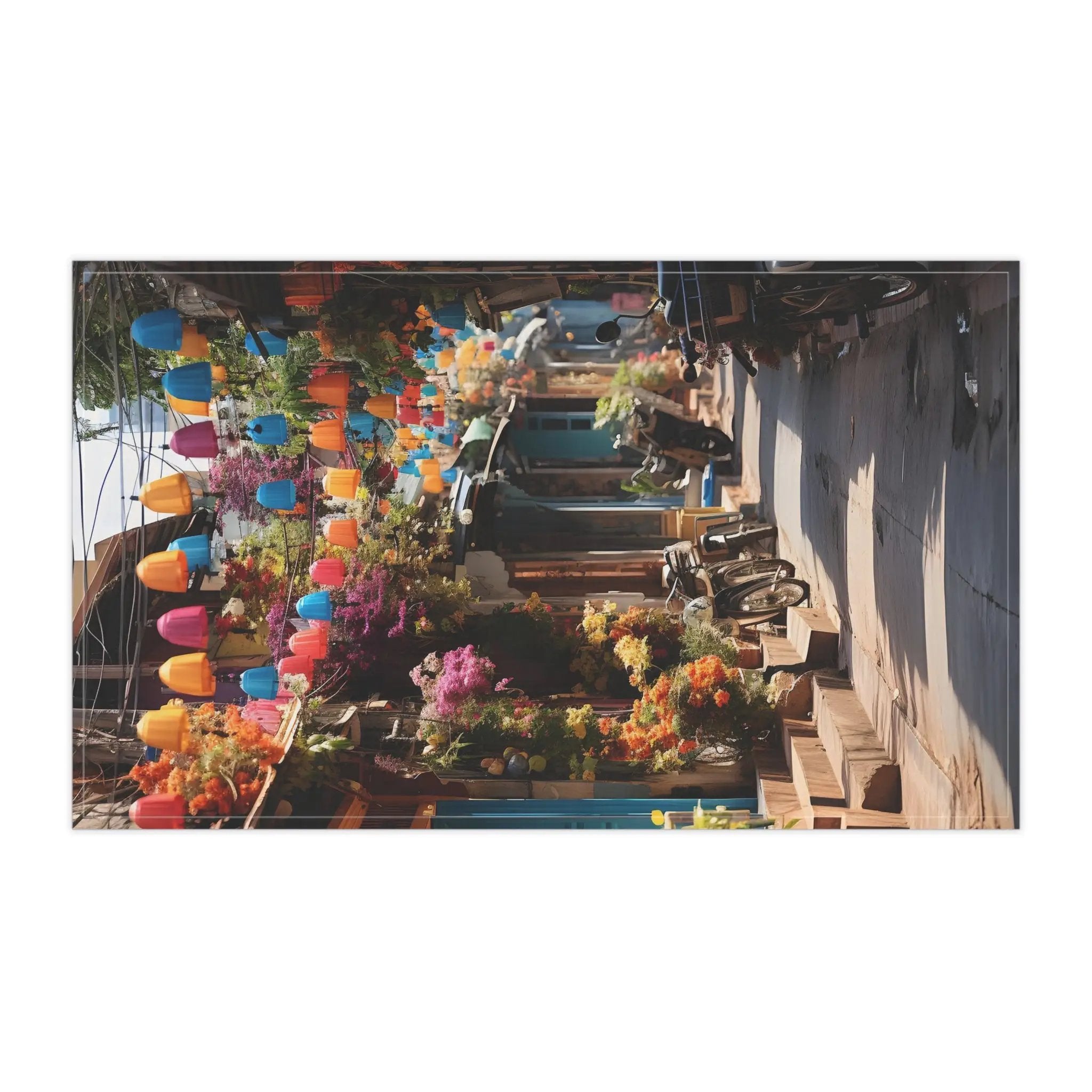 Kitchen Towel | a bunch of colorful umbrellas hanging from the side of a building