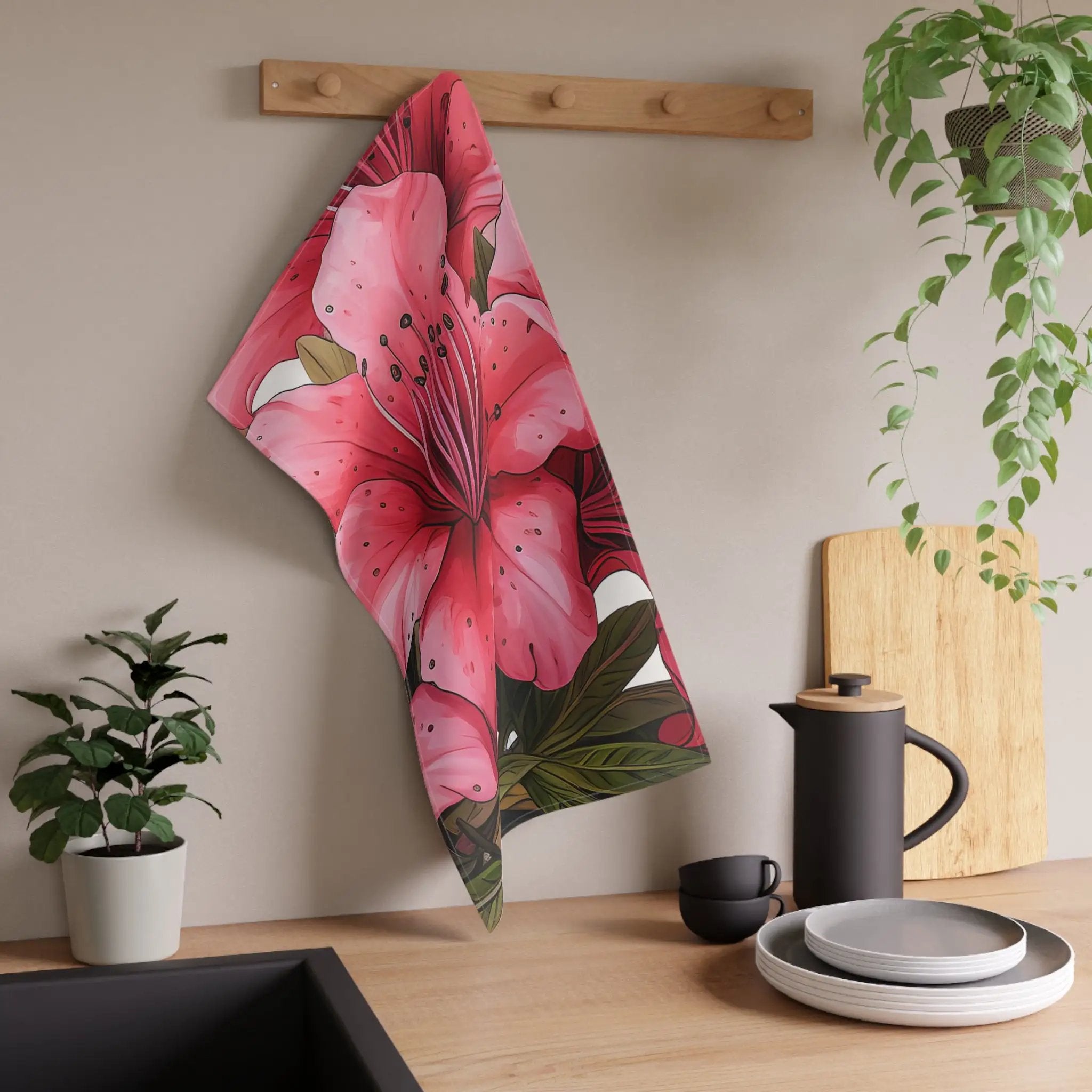 Kitchen Towel | a picture of a pink flower hanging on a wall