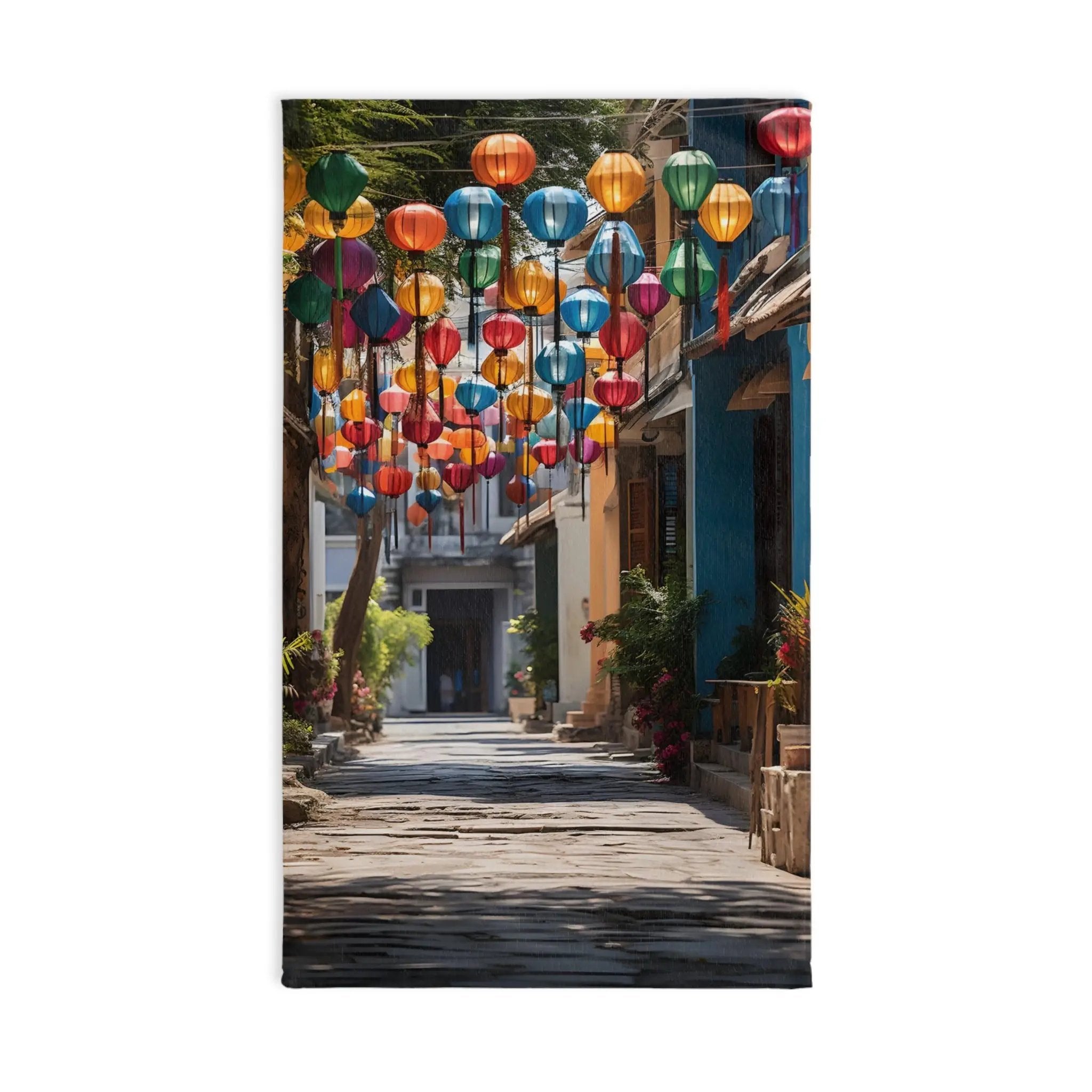 Hand towel | a street with a bunch of colorful lanterns hanging from the ceiling