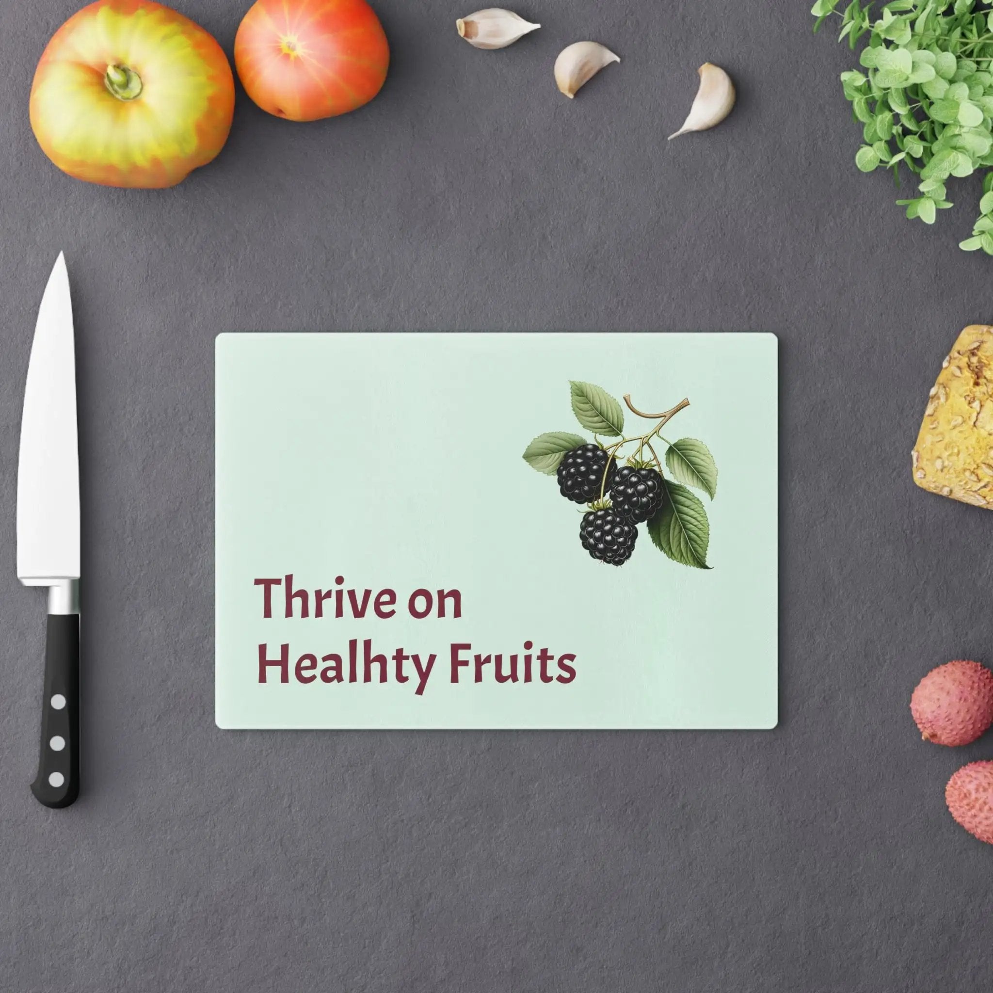 Cutting board | a table topped with fruits and vegetables next to a knife