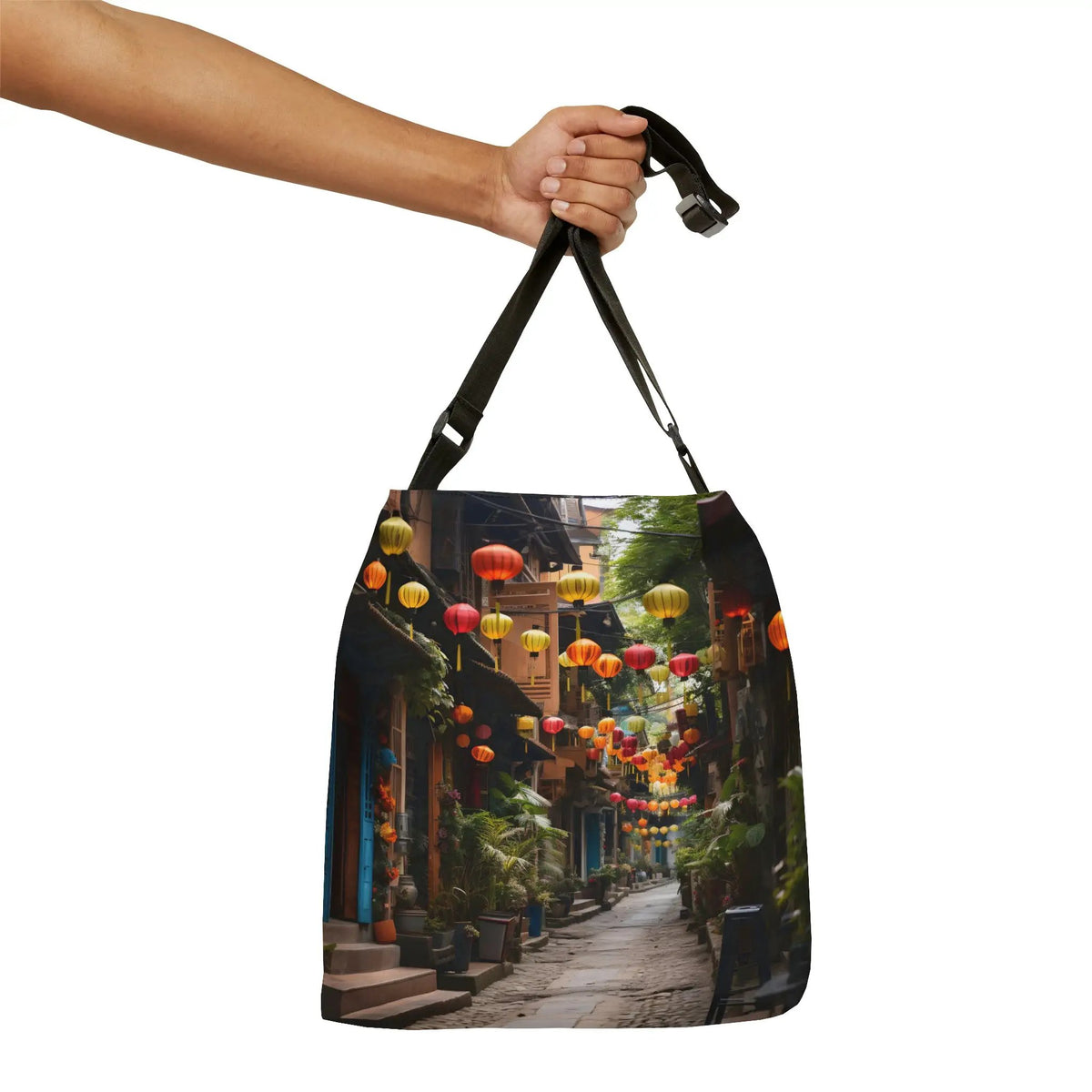 Weekender tote bag | a hand holding a bag with a picture of a street