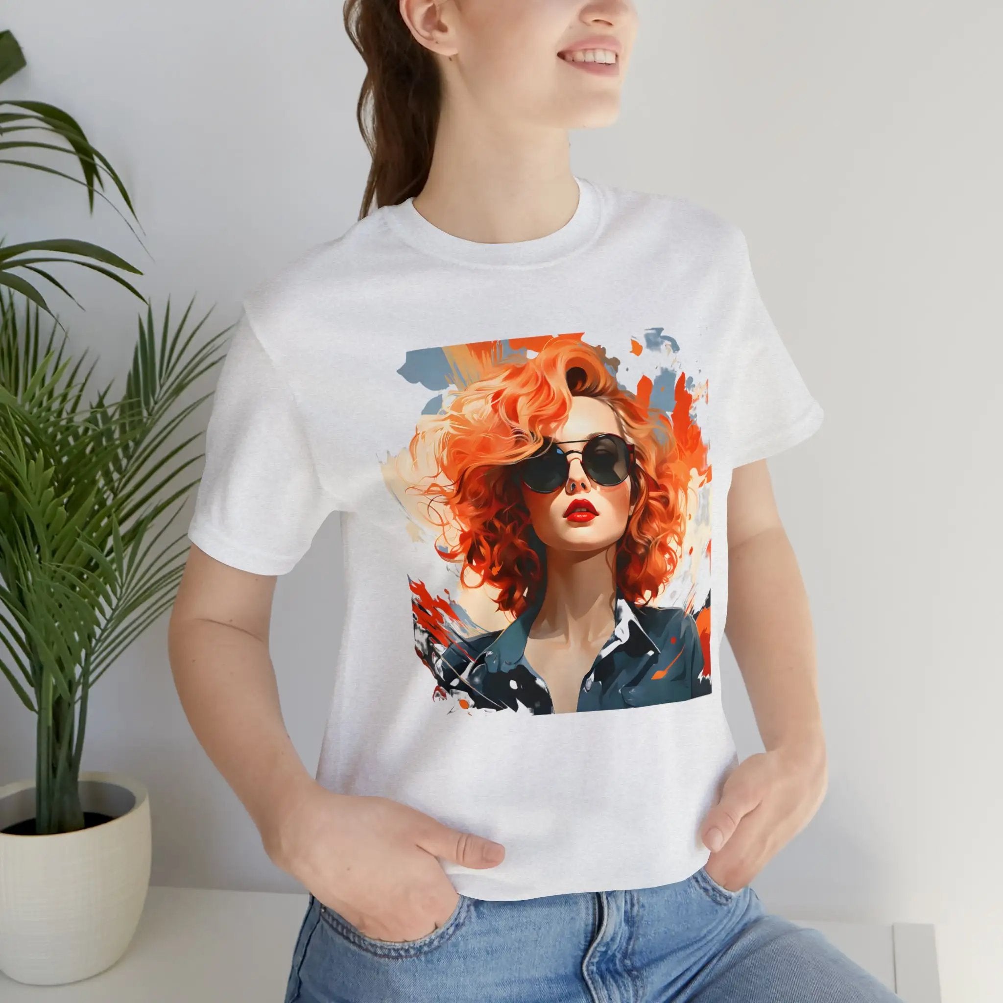 Couple t shirt | a woman wearing a t - shirt with a picture of a woman on it