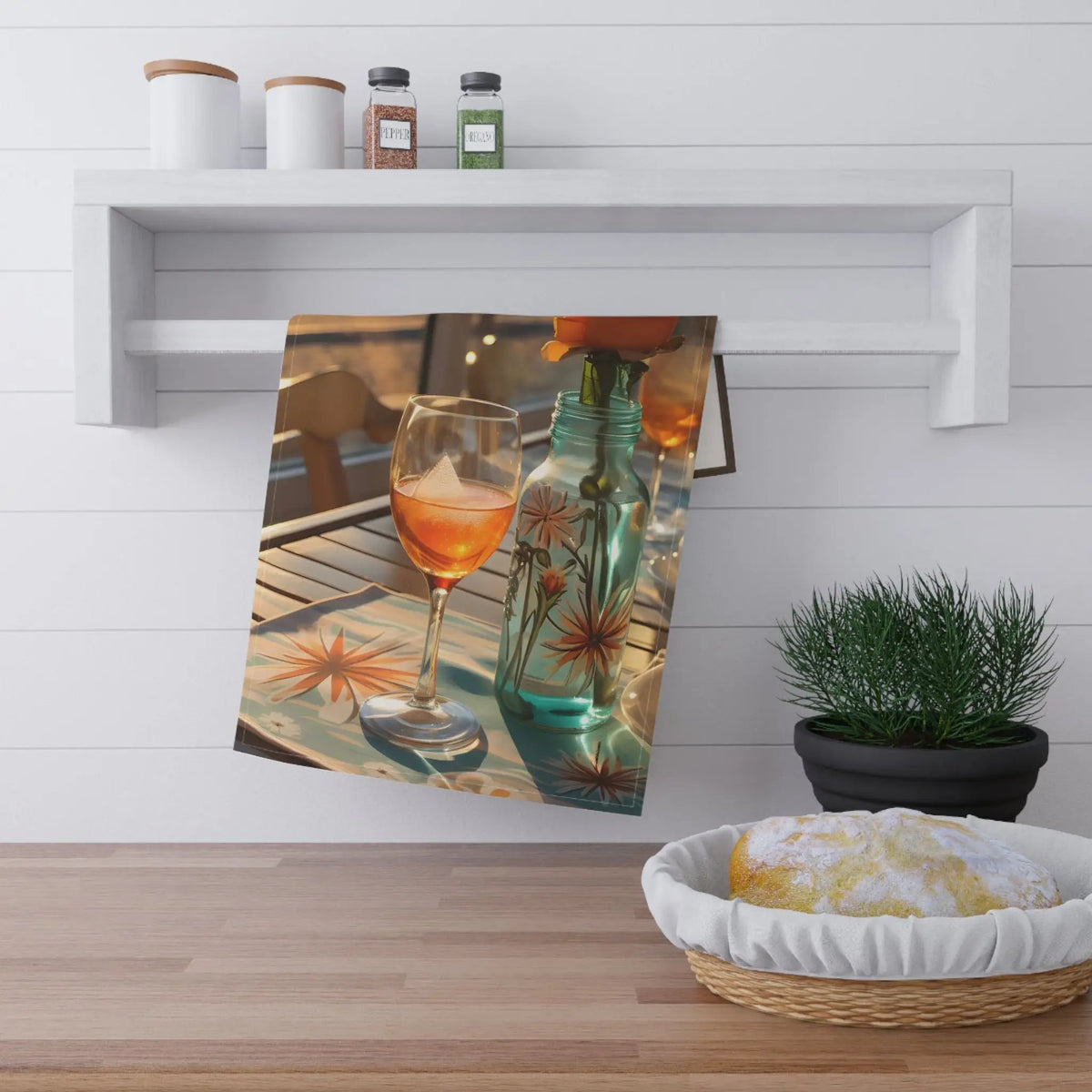 Kitchen Towel | a table with a bowl of food and a glass of wine