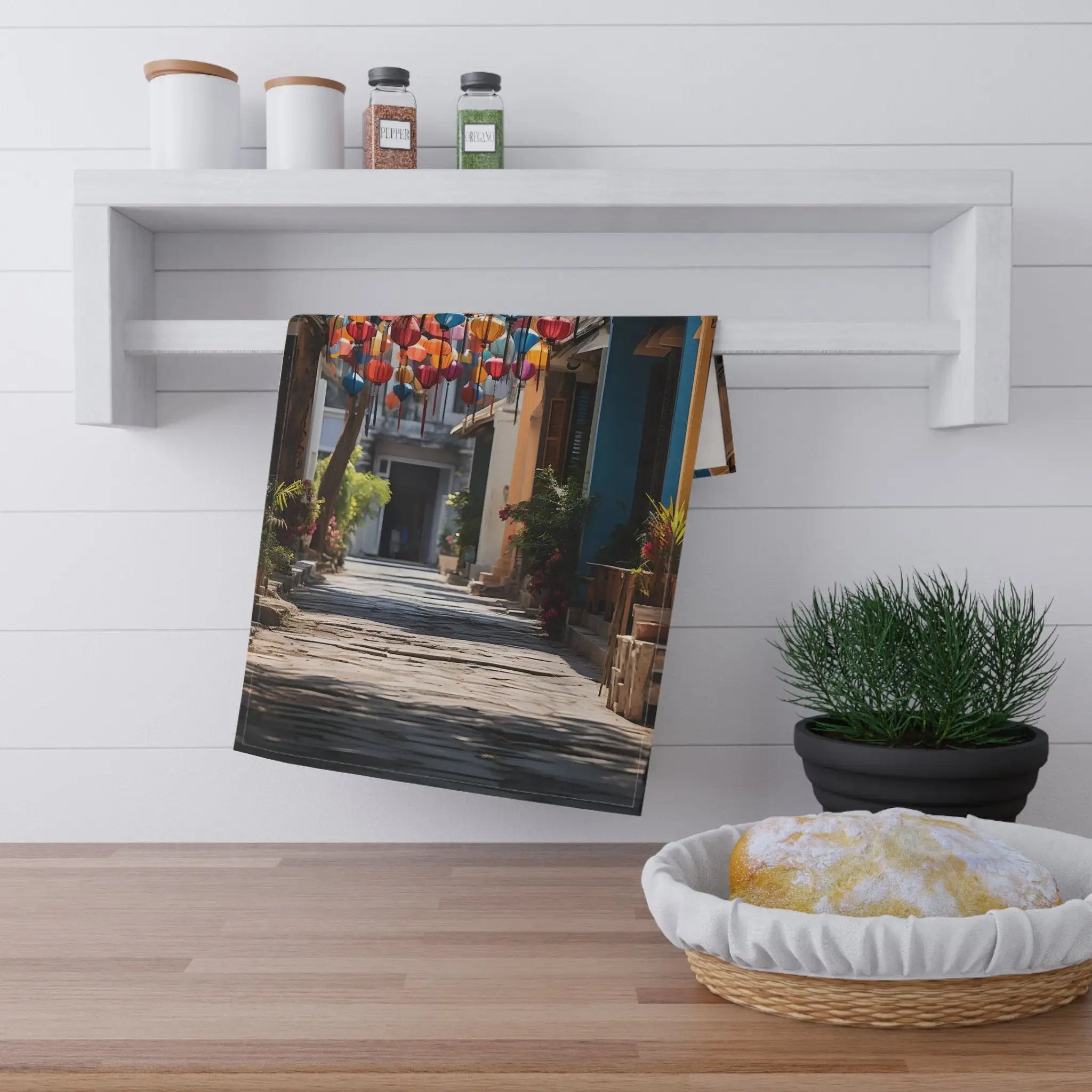 Kitchen Towel | a picture of a street with a basket and a potted plant