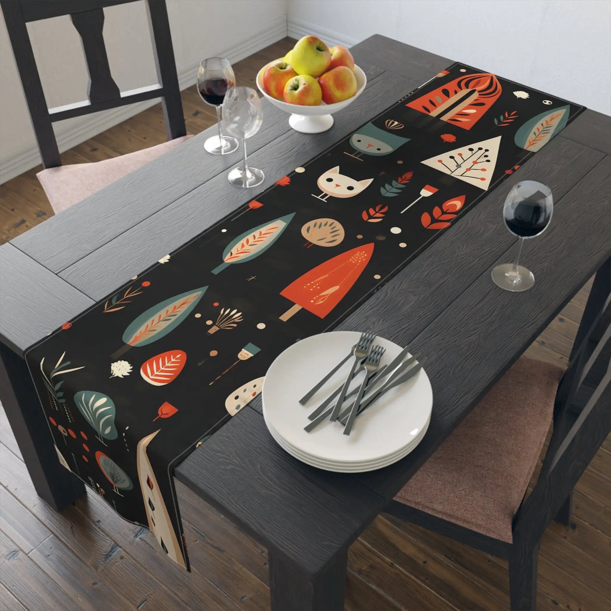 Table runner | a table with a black table runner with a space theme