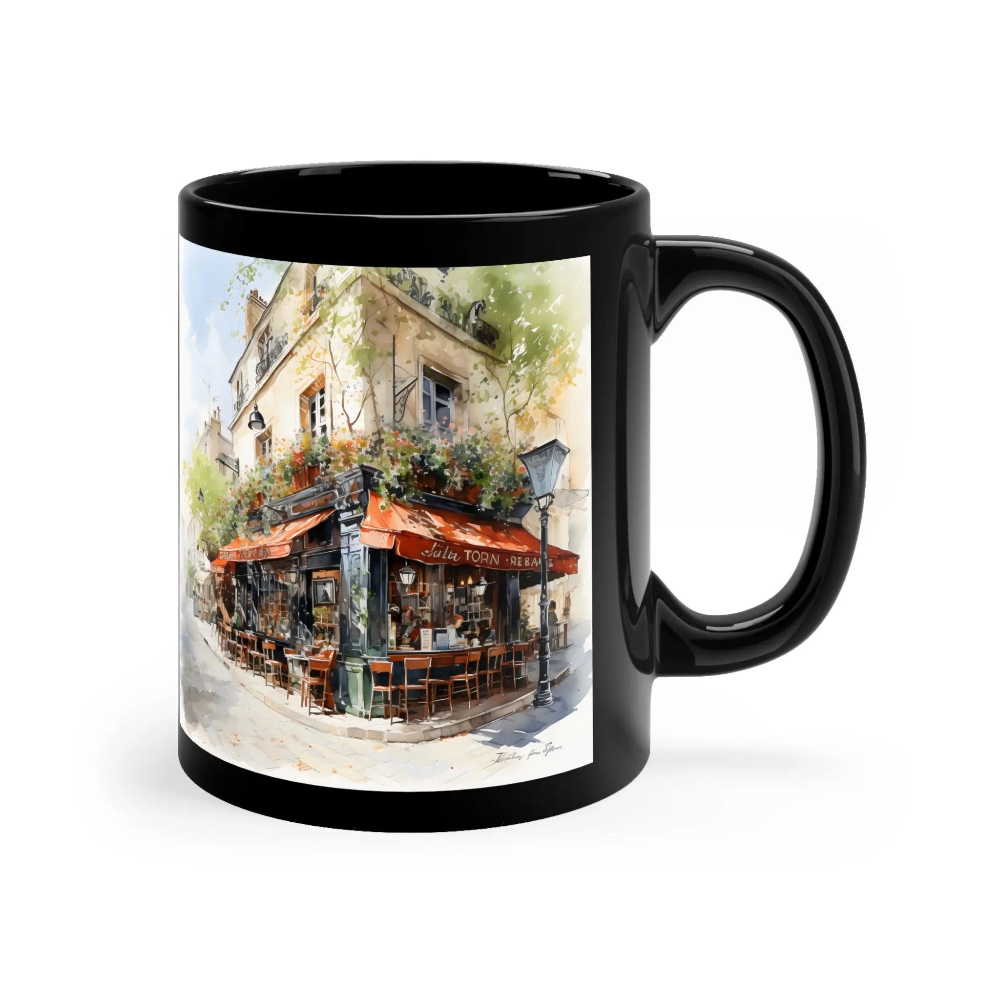 Mugs coffee | a black coffee mug with a painting of a cafe