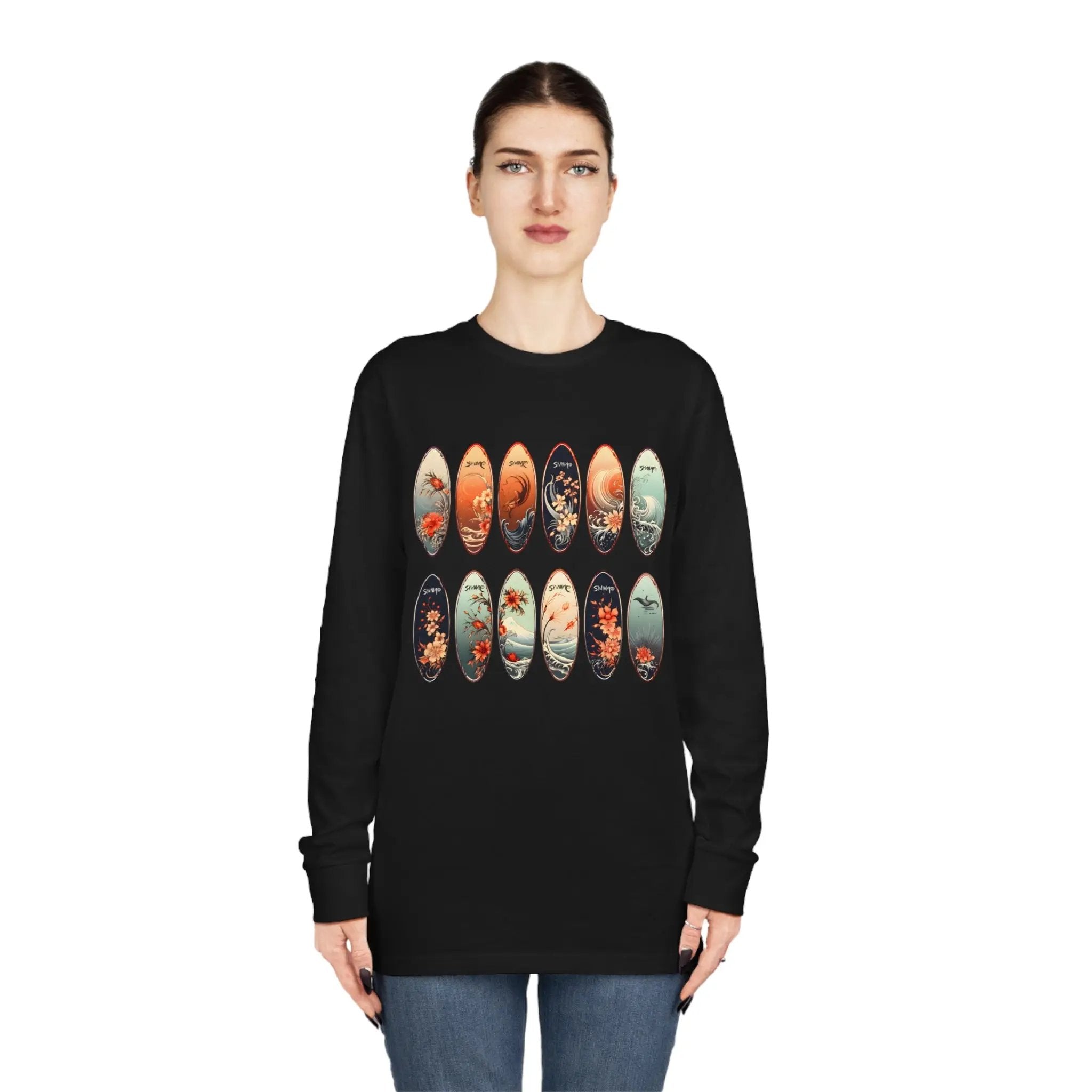 Long Sleeve t shirt | a woman wearing a black shirt with a bunch of skateboards on it