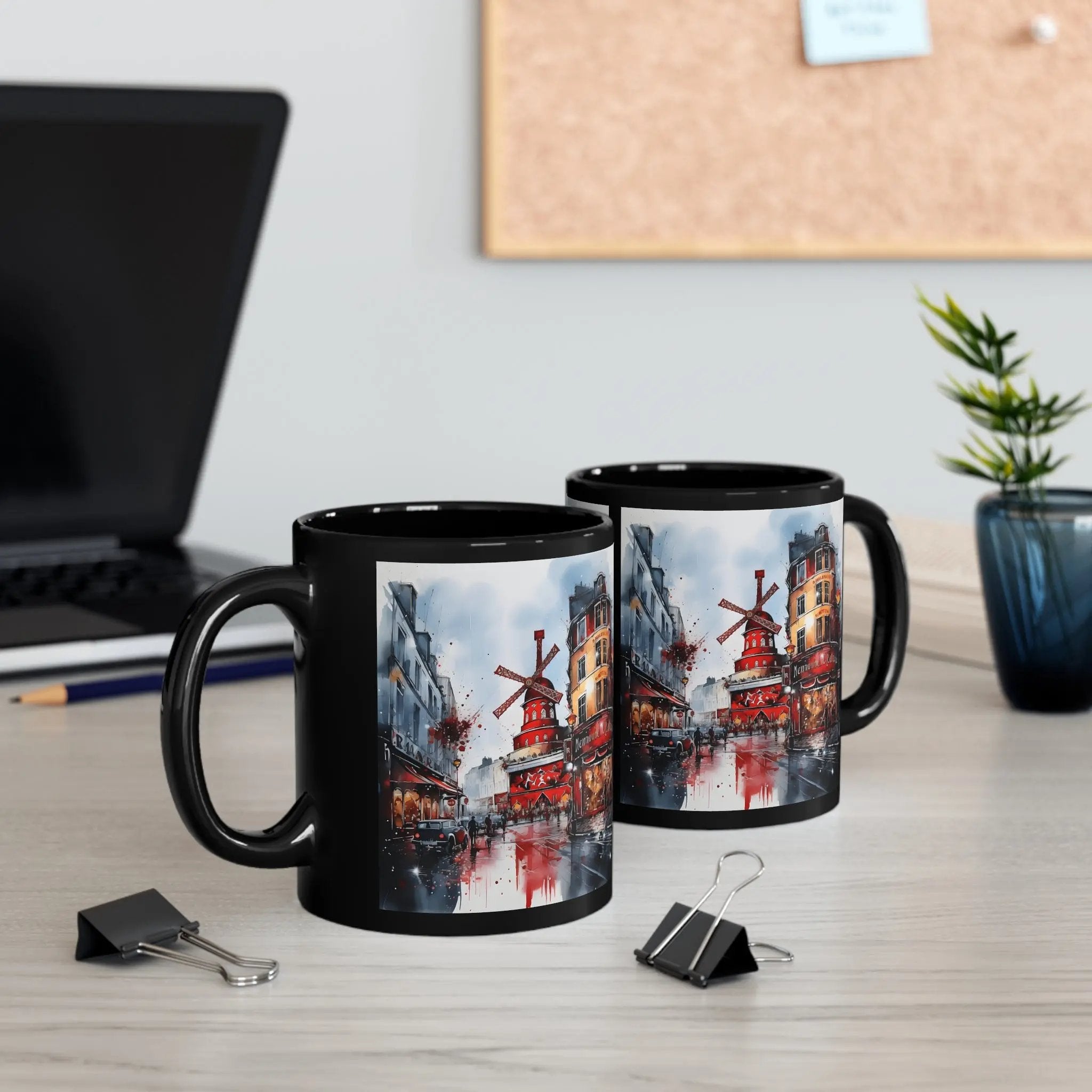 Mugs coffee | two black coffee mugs sitting on top of a table