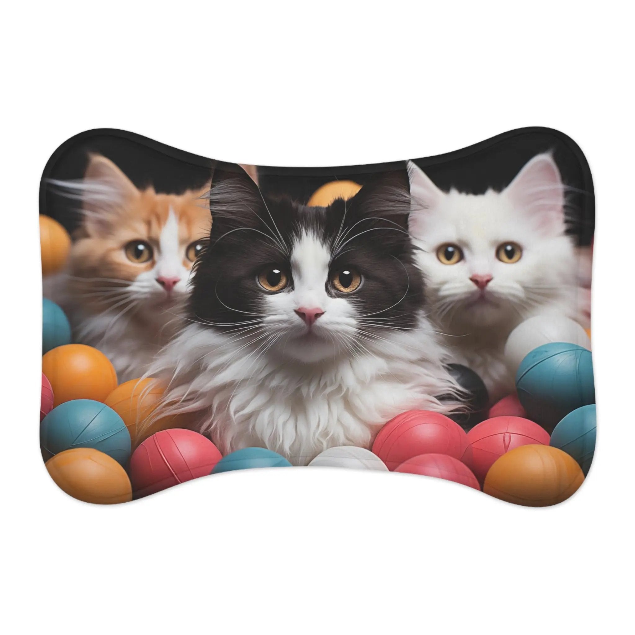 Pet Feeding Mats | a picture of three cats in a ball pit