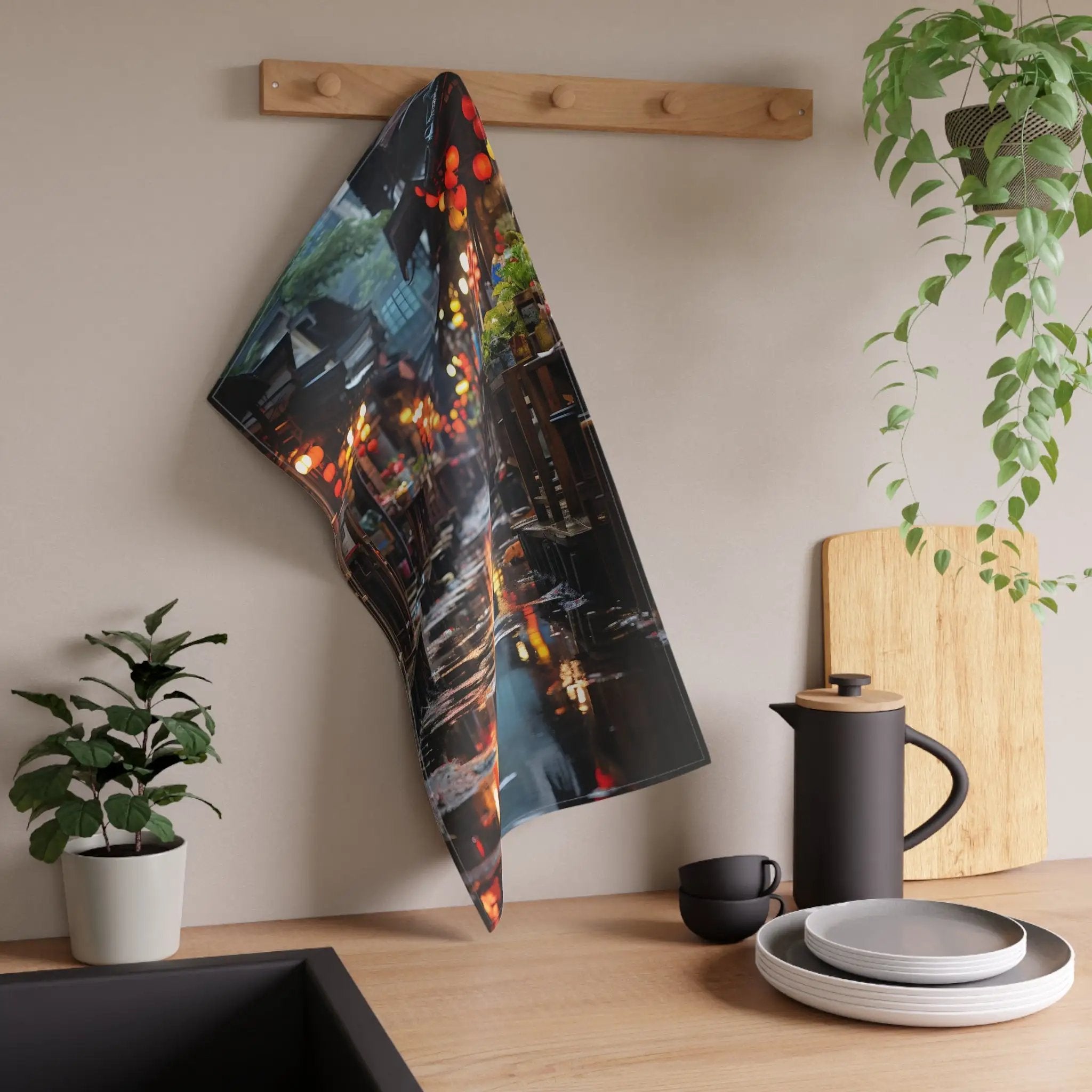 Kitchen Towel | a picture of a city is hanging on a wall