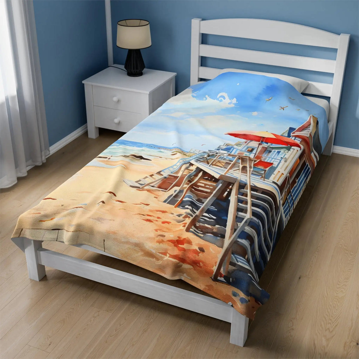 bedroom Blanket | a bed with a painting of a beach scene on it