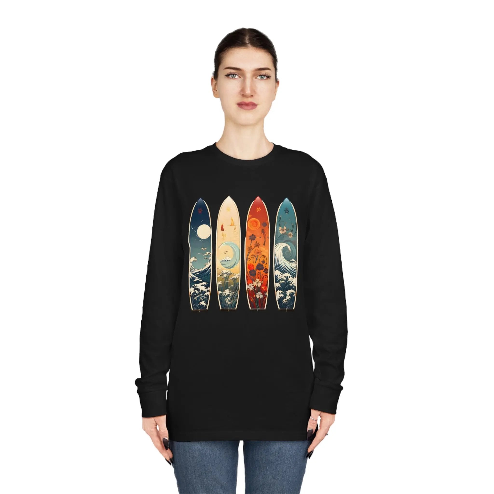 Long Sleeve t shirt | a woman wearing a black shirt with three surfboards on it