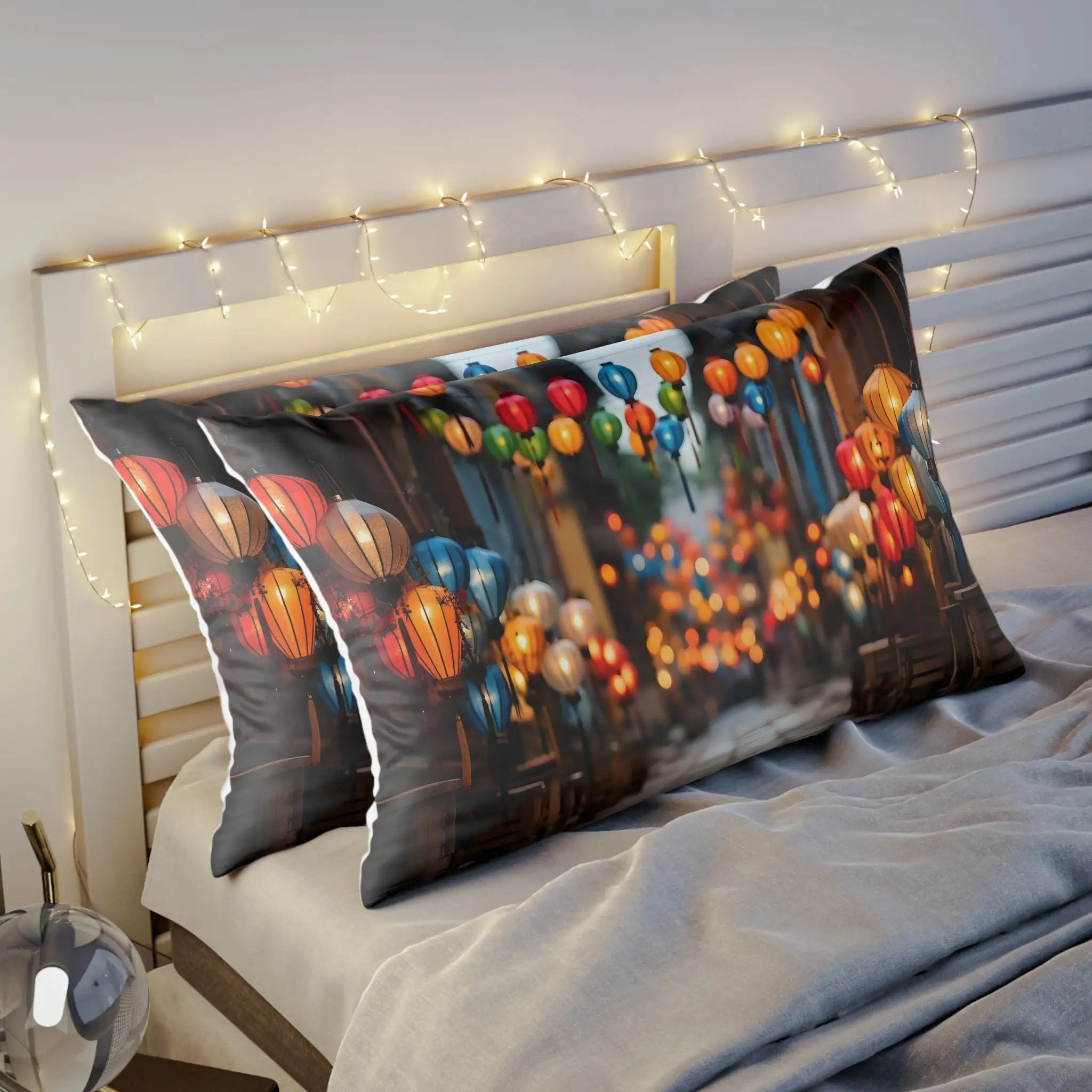 Pillow Sham | a bed topped with two pillows covered in colorful balloons