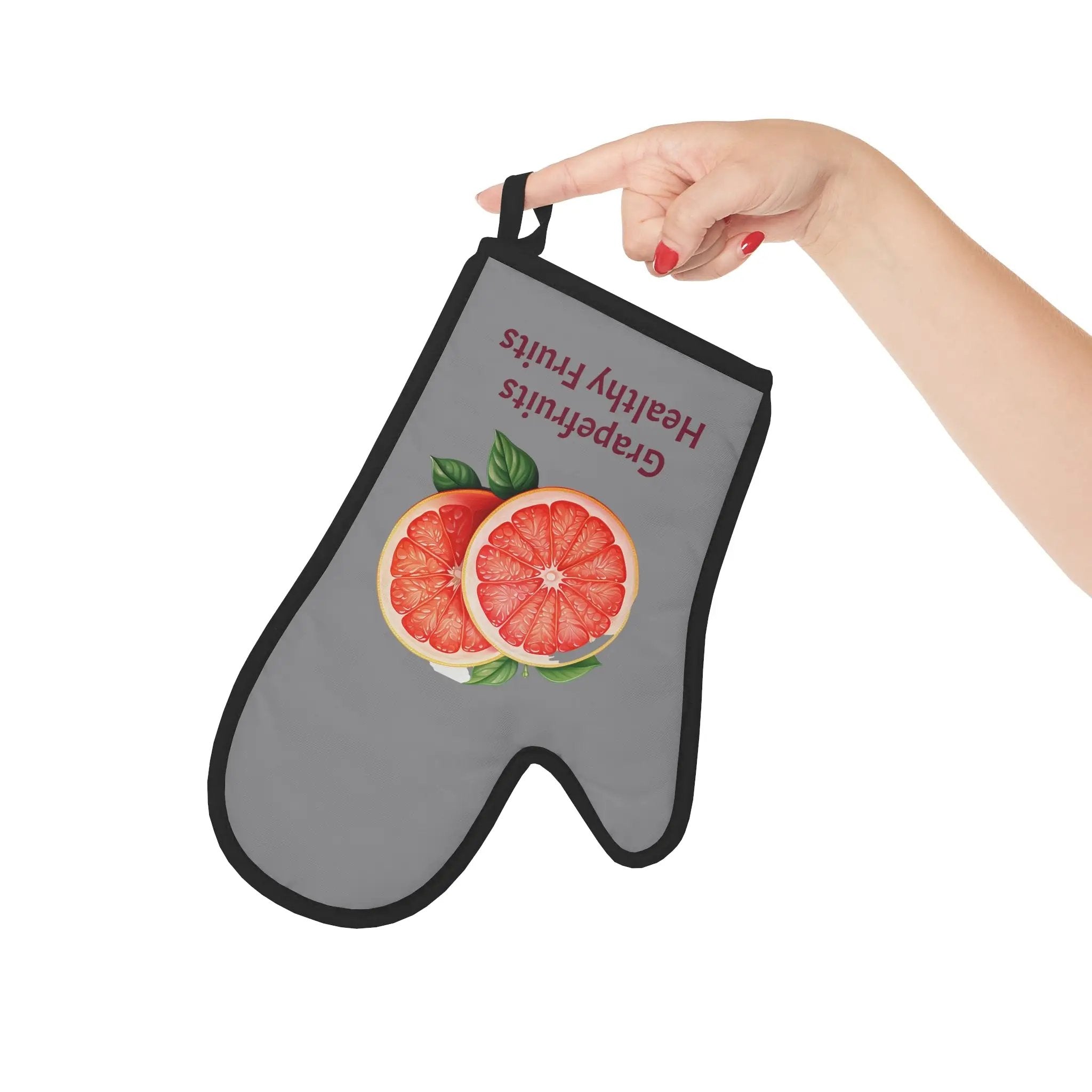 oven mitt | a person holding a bag with a grapefruit on it