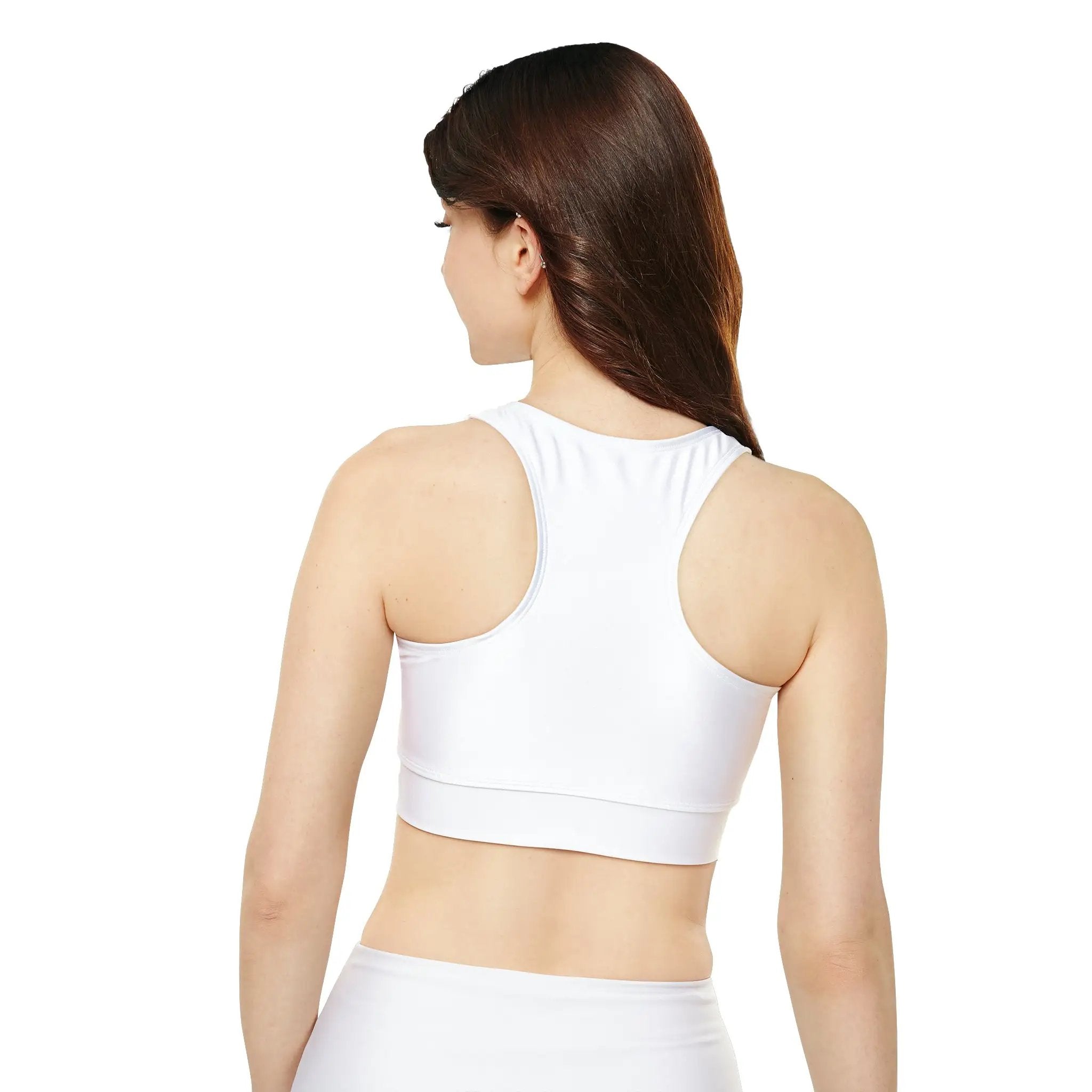 woman sports bra | a woman wearing a white sports bra top