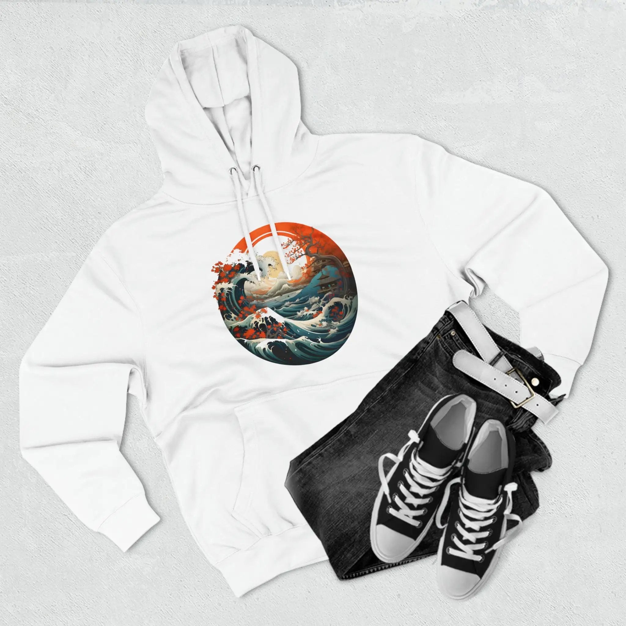 pullover hoodie | a white hoodie with a picture of a ship on it and a pair of