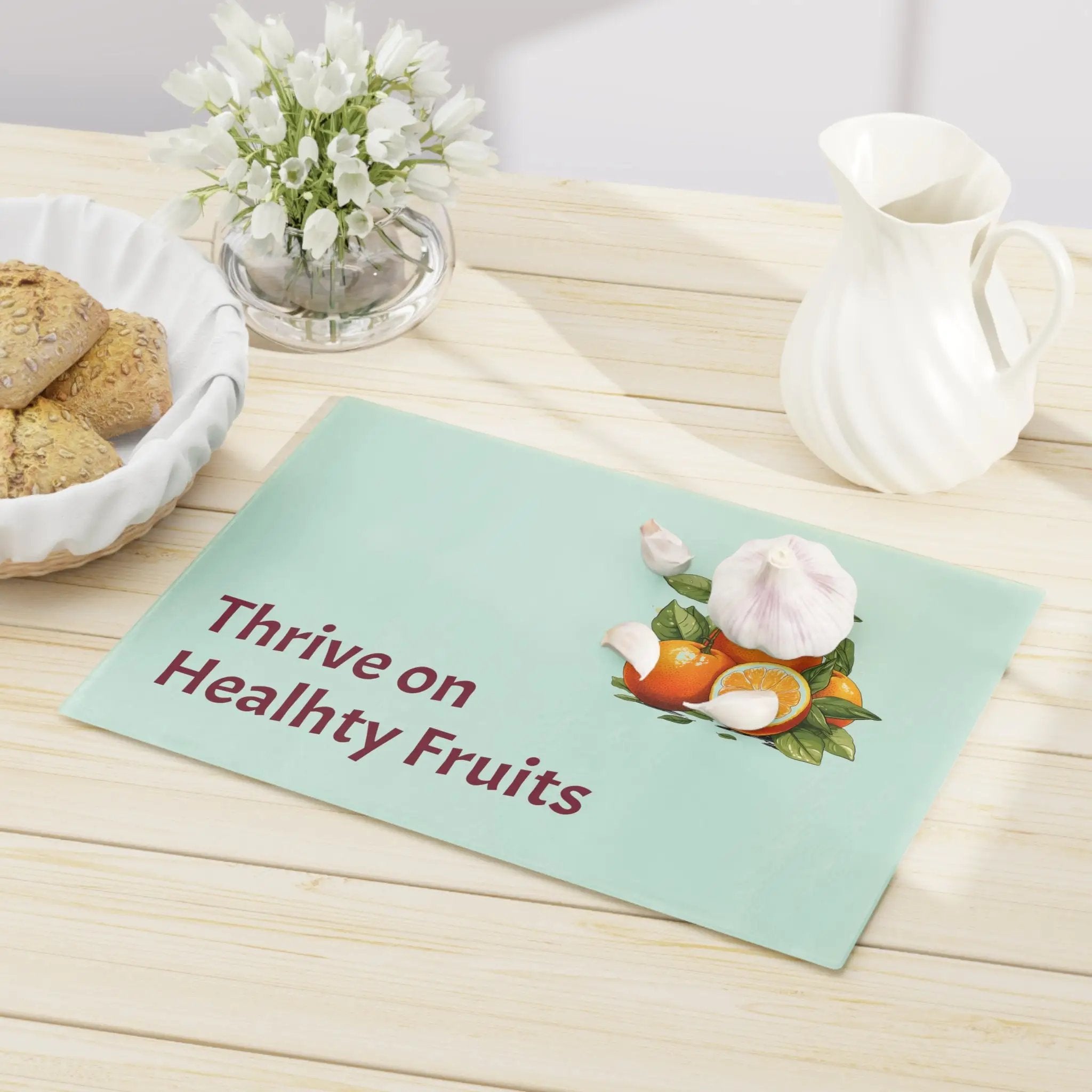 Cutting board | a table with a bowl of cookies and a plate of cookies