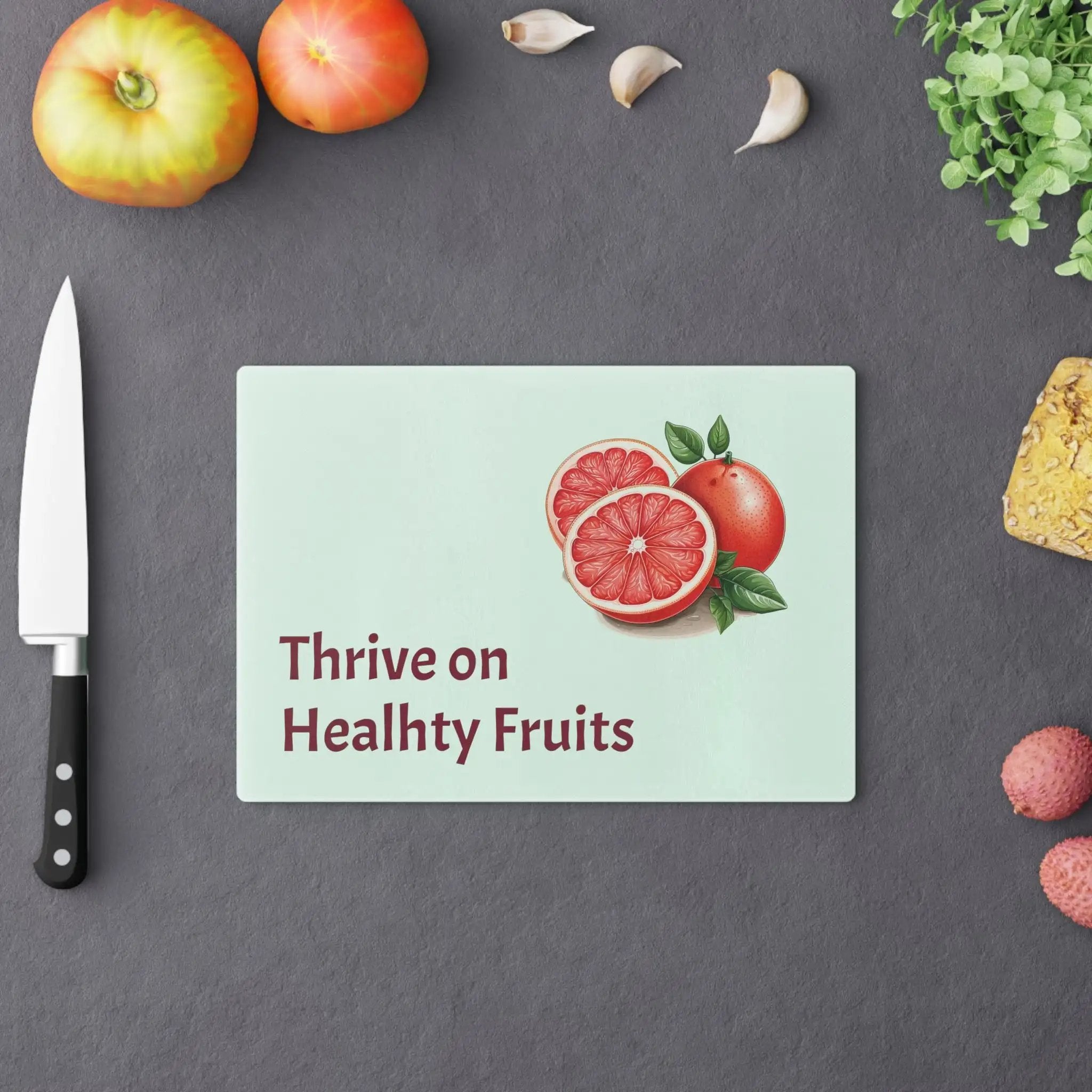 Cutting board | a cutting board with fruit on it next to a knife